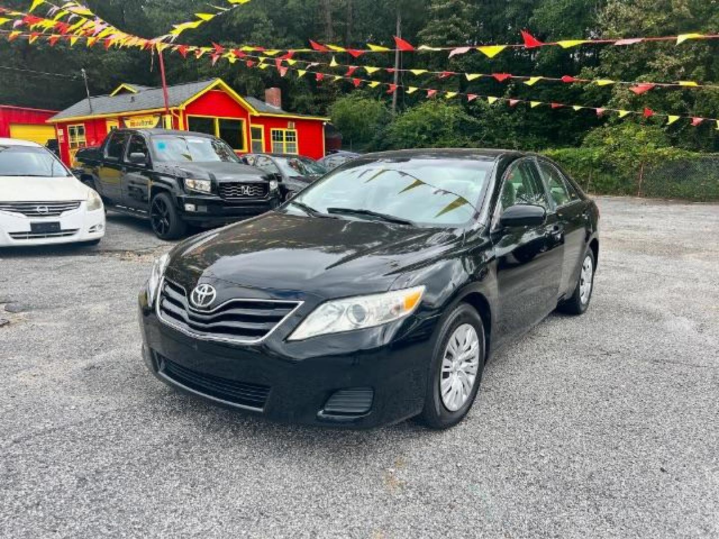 2011 Black Toyota Camry Base 6-Spd AT (4T1BF3EK6BU) with an 2.5L L4 DOHC 16V engine, 6-Speed Automatic transmission, located at 1806 Veterans Memorial Hwy SW, Austell, GA, 30168, (770) 944-9558, 33.817959, -84.606987 - Photo#0