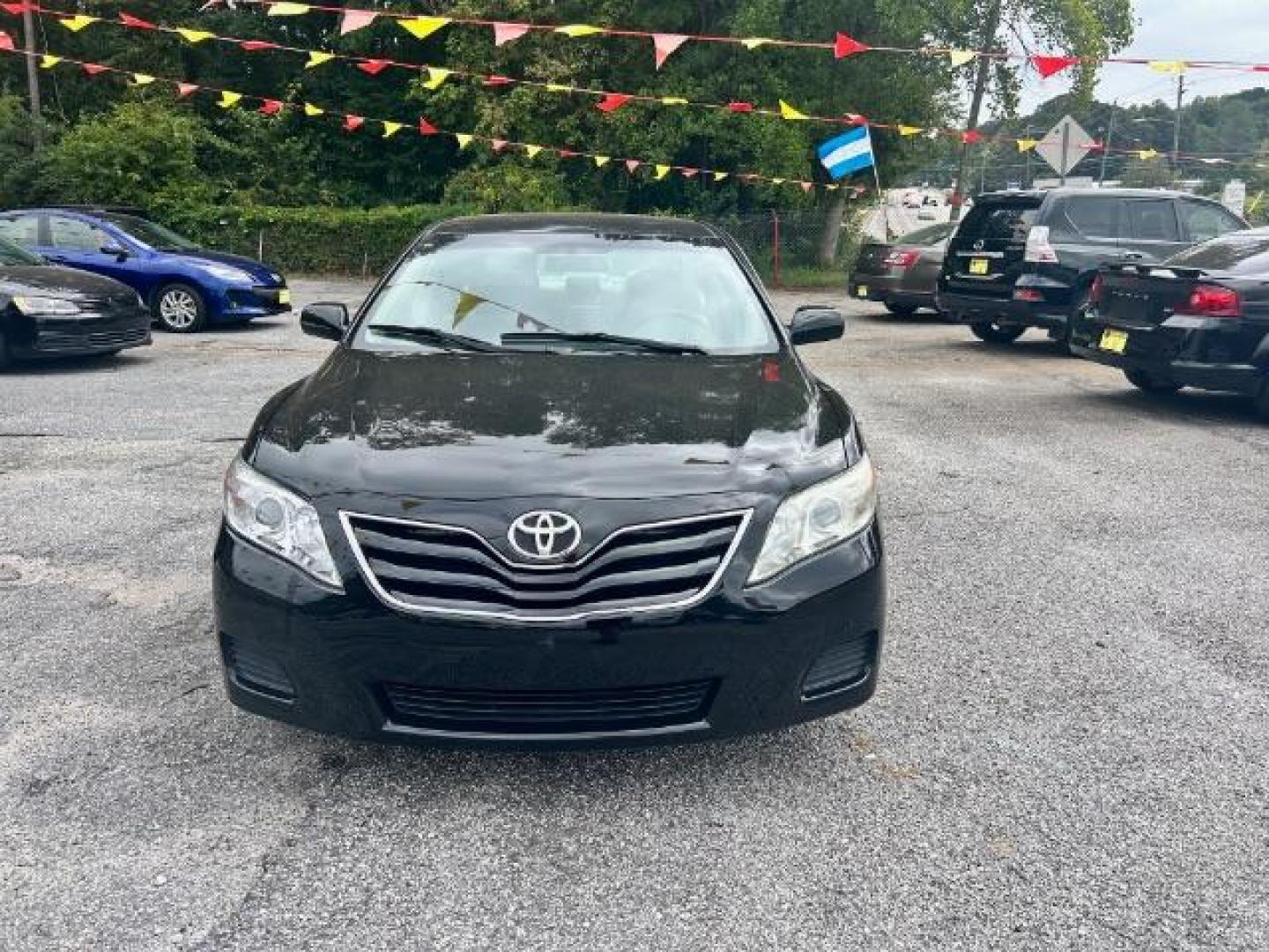 2011 Black Toyota Camry Base 6-Spd AT (4T1BF3EK6BU) with an 2.5L L4 DOHC 16V engine, 6-Speed Automatic transmission, located at 1806 Veterans Memorial Hwy SW, Austell, GA, 30168, (770) 944-9558, 33.817959, -84.606987 - Photo#1