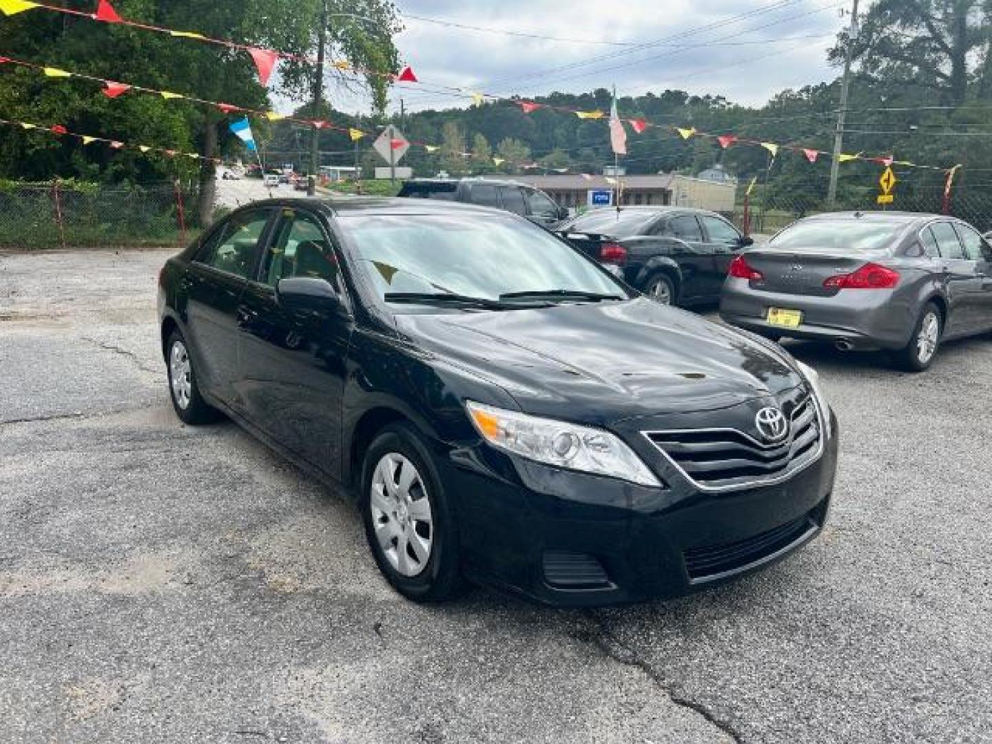 2011 Black Toyota Camry Base 6-Spd AT (4T1BF3EK6BU) with an 2.5L L4 DOHC 16V engine, 6-Speed Automatic transmission, located at 1806 Veterans Memorial Hwy SW, Austell, GA, 30168, (770) 944-9558, 33.817959, -84.606987 - Photo#2