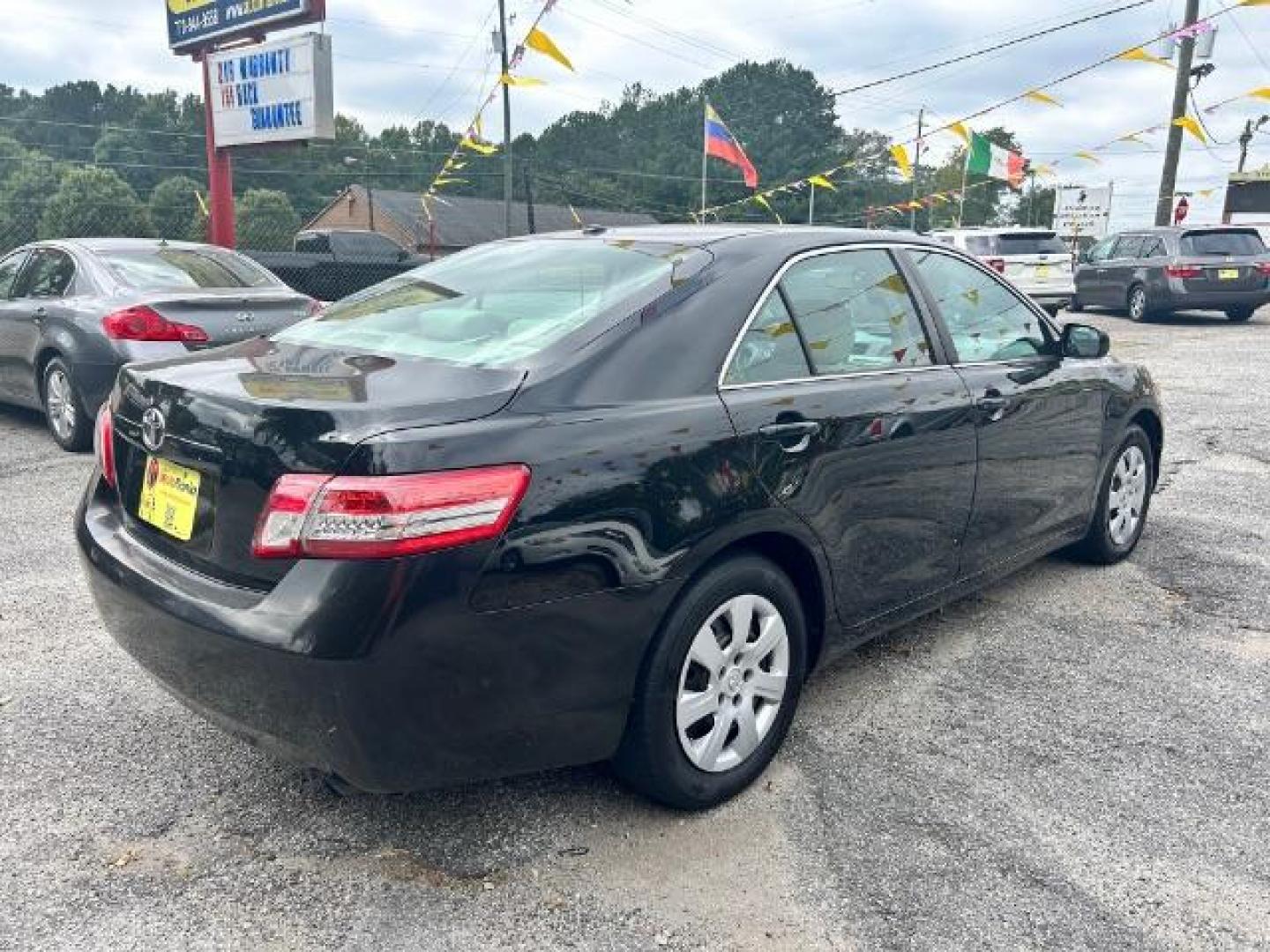 2011 Black Toyota Camry Base 6-Spd AT (4T1BF3EK6BU) with an 2.5L L4 DOHC 16V engine, 6-Speed Automatic transmission, located at 1806 Veterans Memorial Hwy SW, Austell, GA, 30168, (770) 944-9558, 33.817959, -84.606987 - Photo#3