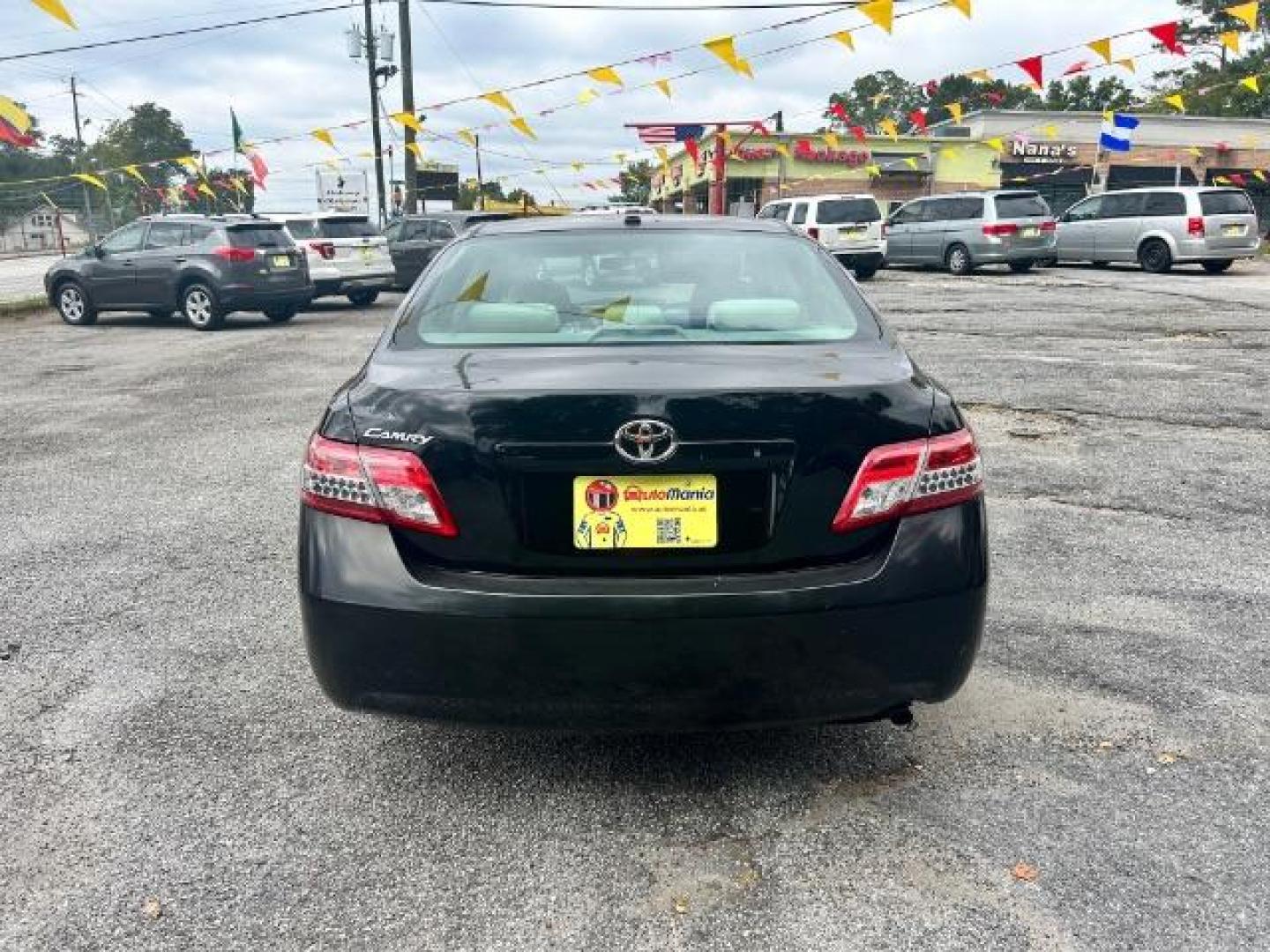 2011 Black Toyota Camry Base 6-Spd AT (4T1BF3EK6BU) with an 2.5L L4 DOHC 16V engine, 6-Speed Automatic transmission, located at 1806 Veterans Memorial Hwy SW, Austell, GA, 30168, (770) 944-9558, 33.817959, -84.606987 - Photo#4