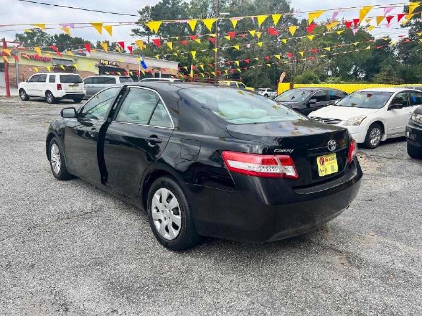 2011 Black Toyota Camry Base 6-Spd AT (4T1BF3EK6BU) with an 2.5L L4 DOHC 16V engine, 6-Speed Automatic transmission, located at 1806 Veterans Memorial Hwy SW, Austell, GA, 30168, (770) 944-9558, 33.817959, -84.606987 - Photo#5