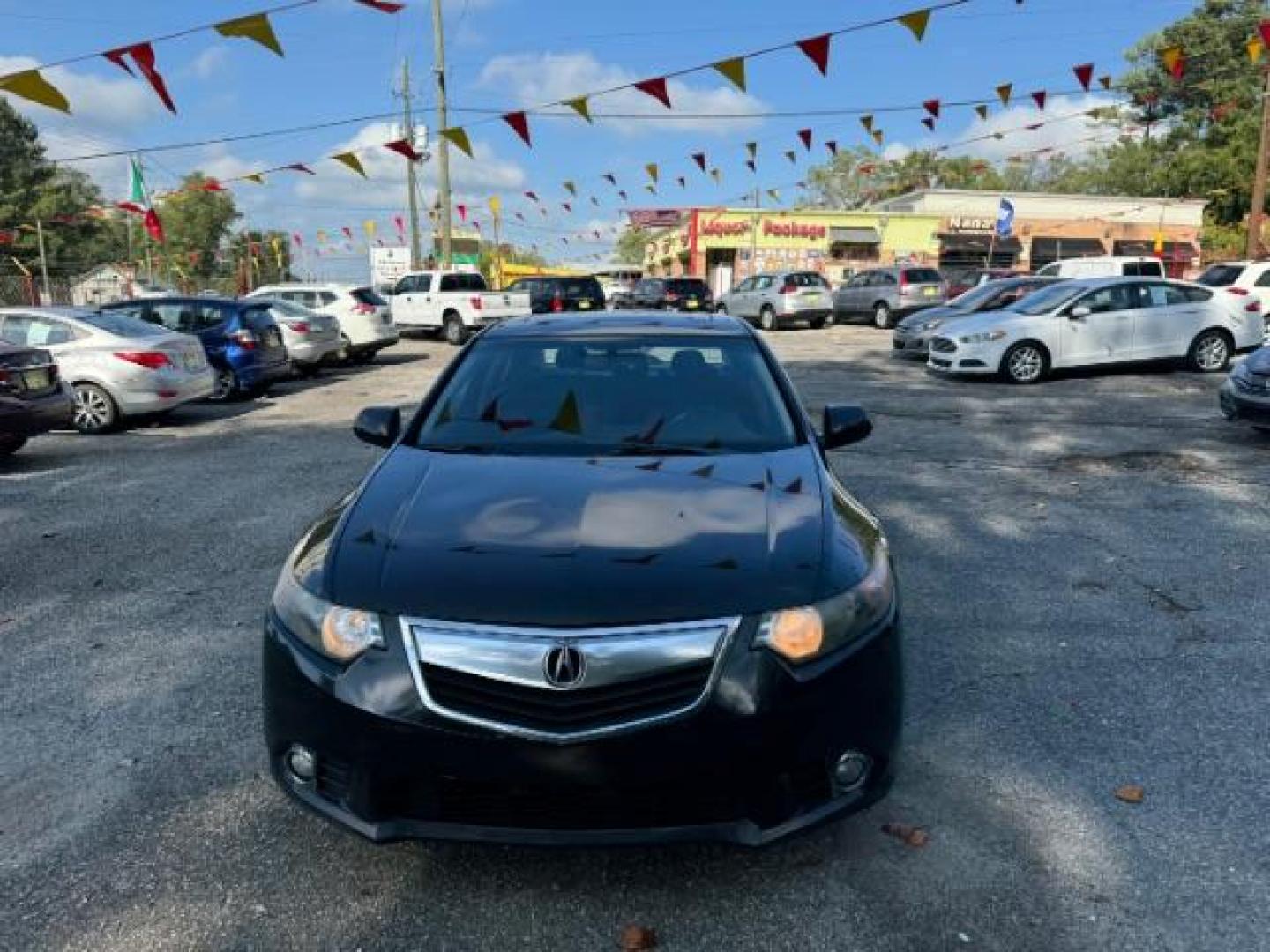 2013 Black Acura TSX 5-Speed AT (JH4CU2F40DC) with an 2.4L L4 DOHC 16V engine, 5-Speed Automatic transmission, located at 1806 Veterans Memorial Hwy SW, Austell, GA, 30168, (770) 944-9558, 33.817959, -84.606987 - Photo#1