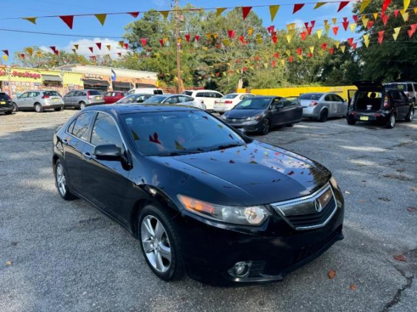 2013 Black Acura TSX 5-Speed AT (JH4CU2F40DC) with an 2.4L L4 DOHC 16V engine, 5-Speed Automatic transmission, located at 1806 Veterans Memorial Hwy SW, Austell, GA, 30168, (770) 944-9558, 33.817959, -84.606987 - Photo#2