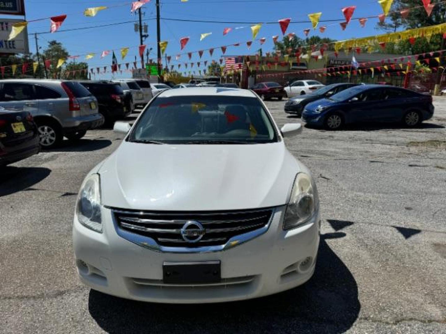 2012 White Nissan Altima 2.5 S (1N4AL2AP4CC) with an 2.5L L4 DOHC 16V engine, Continuously Variable Transmission transmission, located at 1806 Veterans Memorial Hwy SW, Austell, GA, 30168, (770) 944-9558, 33.817959, -84.606987 - Photo#1