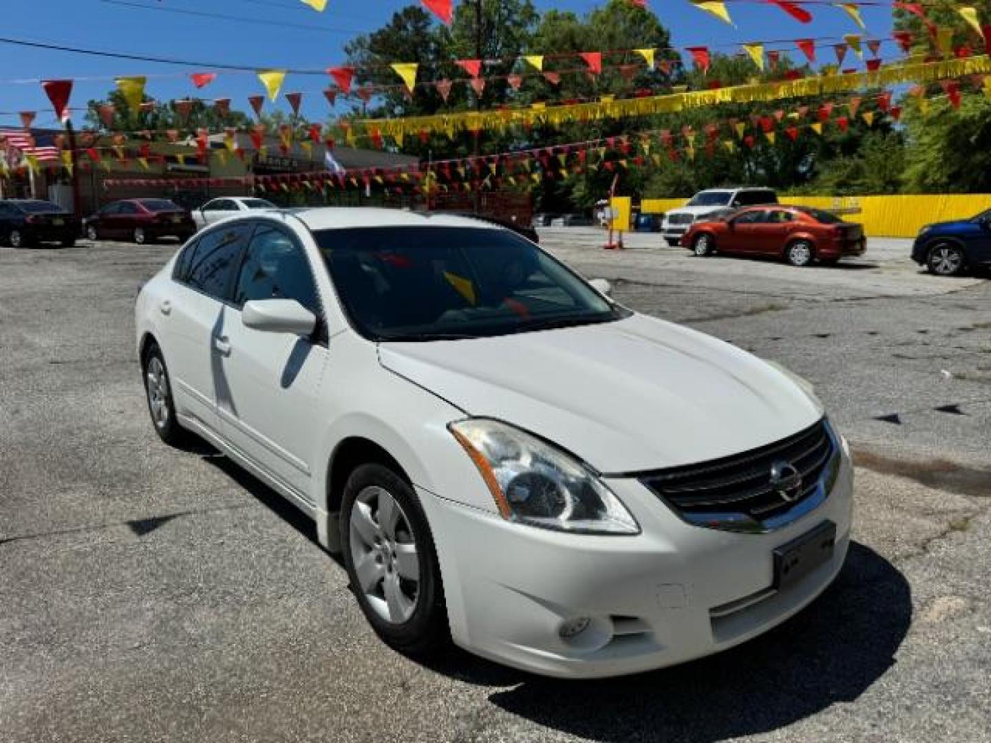 2012 White Nissan Altima 2.5 S (1N4AL2AP4CC) with an 2.5L L4 DOHC 16V engine, Continuously Variable Transmission transmission, located at 1806 Veterans Memorial Hwy SW, Austell, GA, 30168, (770) 944-9558, 33.817959, -84.606987 - Photo#2