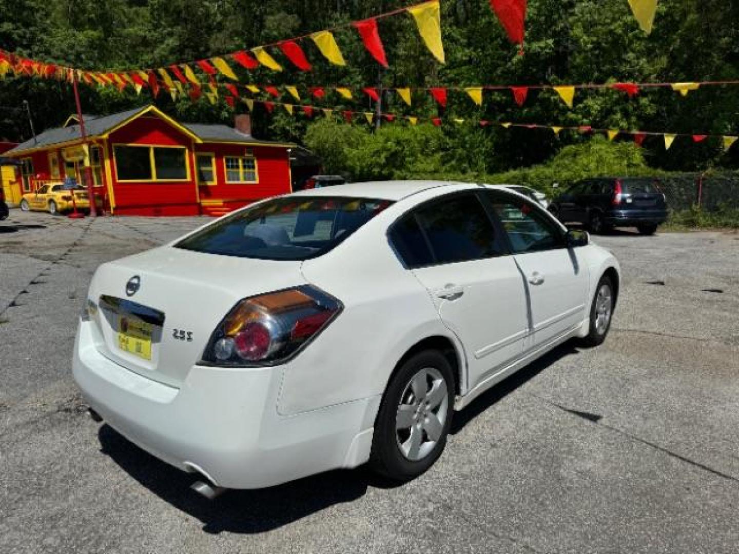 2012 White Nissan Altima 2.5 S (1N4AL2AP4CC) with an 2.5L L4 DOHC 16V engine, Continuously Variable Transmission transmission, located at 1806 Veterans Memorial Hwy SW, Austell, GA, 30168, (770) 944-9558, 33.817959, -84.606987 - Photo#3