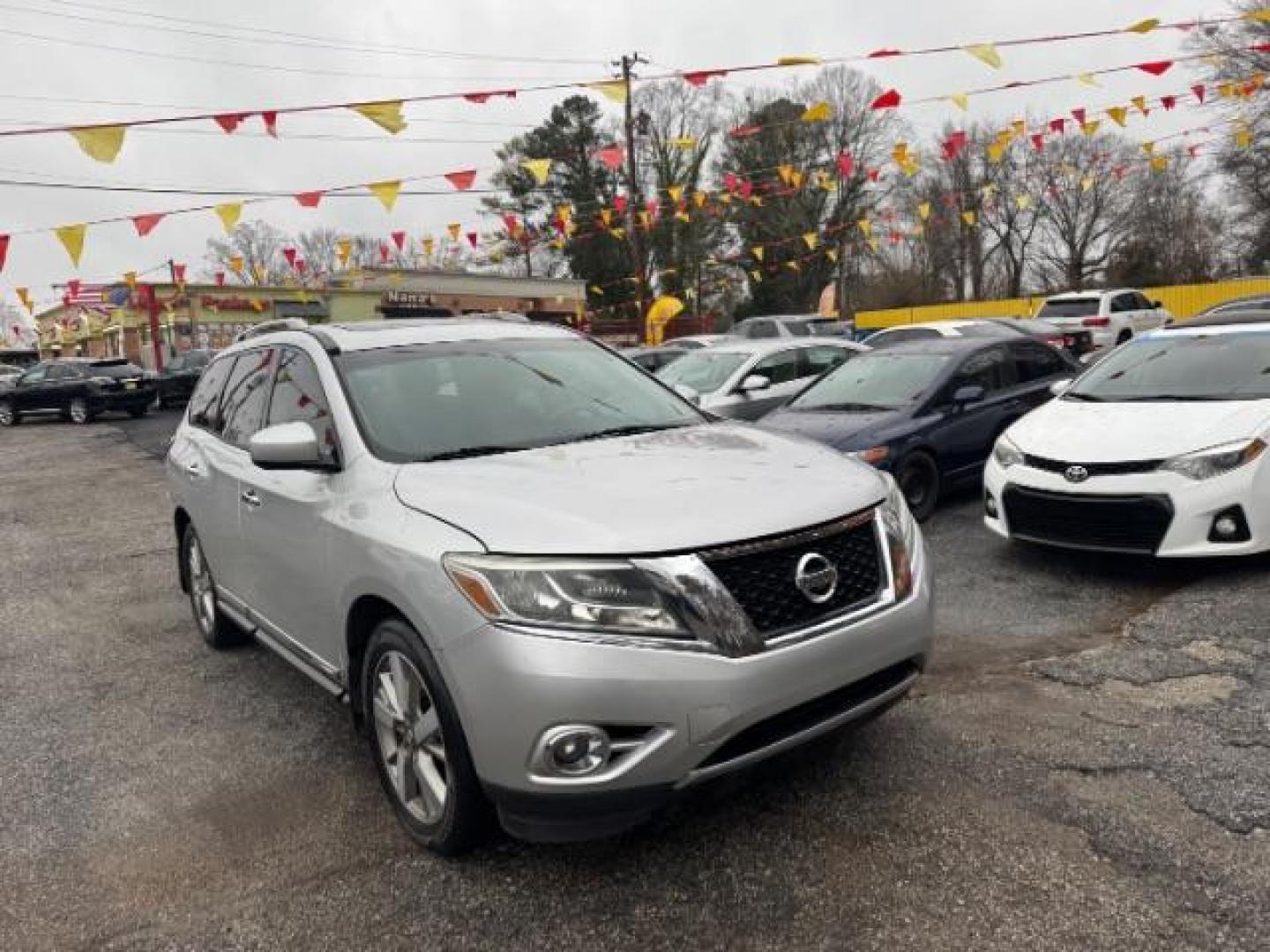 2013 Silver Nissan Pathfinder Platinum 2WD (5N1AR2MN5DC) with an 3.5L V6 DOHC 24V engine, Continuously Variable Transmission transmission, located at 1806 Veterans Memorial Hwy SW, Austell, GA, 30168, (770) 944-9558, 33.817959, -84.606987 - Photo#2