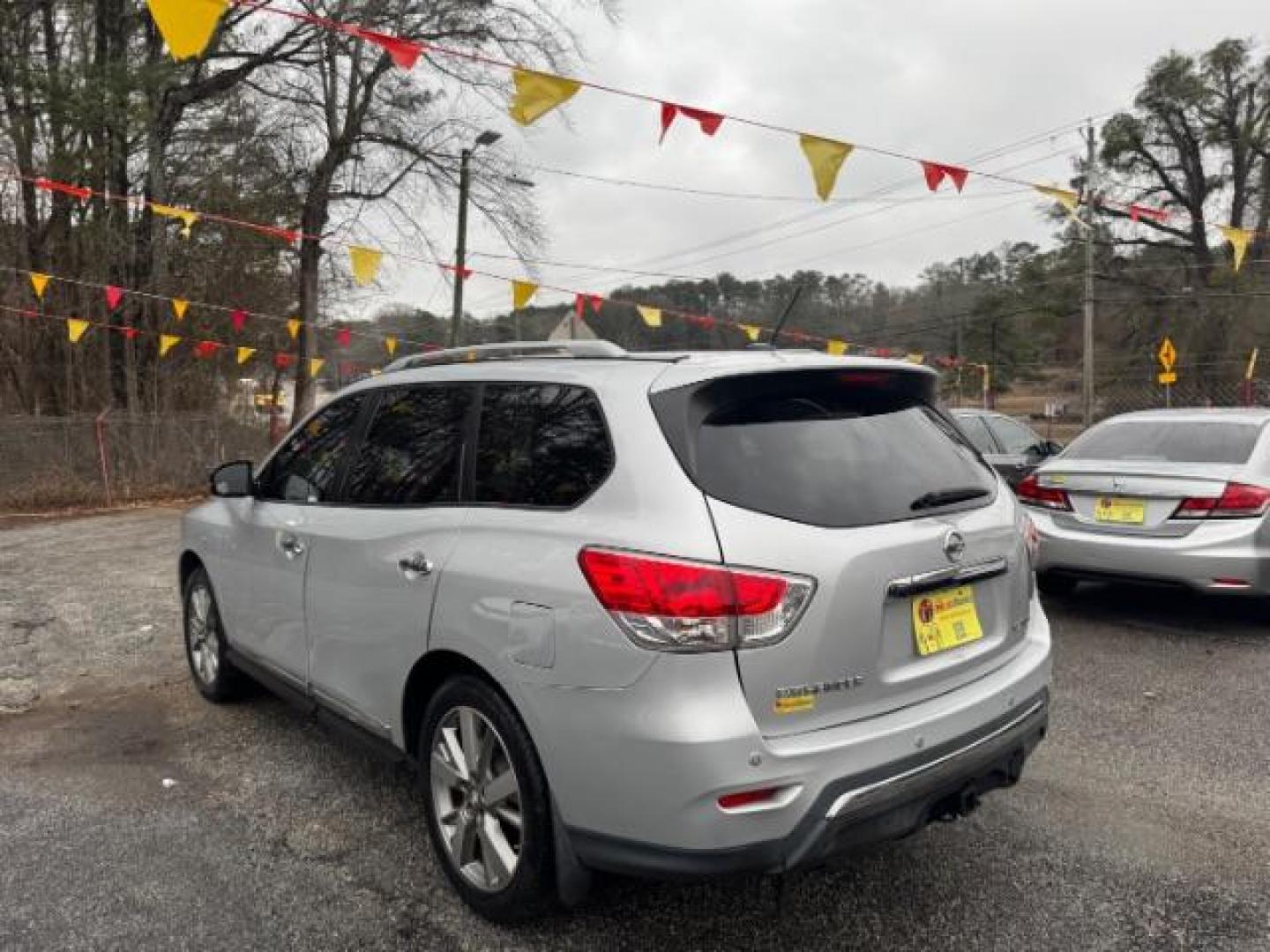 2013 Silver Nissan Pathfinder Platinum 2WD (5N1AR2MN5DC) with an 3.5L V6 DOHC 24V engine, Continuously Variable Transmission transmission, located at 1806 Veterans Memorial Hwy SW, Austell, GA, 30168, (770) 944-9558, 33.817959, -84.606987 - Photo#5