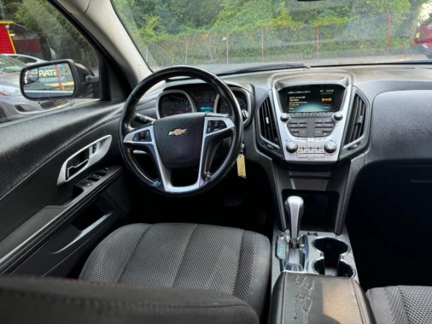 2014 Black Chevrolet Equinox 1LT 2WD (2GNALBEK9E1) with an 2.4L L4 DOHC 16V FFV engine, 6-Speed Automatic transmission, located at 1806 Veterans Memorial Hwy SW, Austell, GA, 30168, (770) 944-9558, 33.817959, -84.606987 - Photo#12