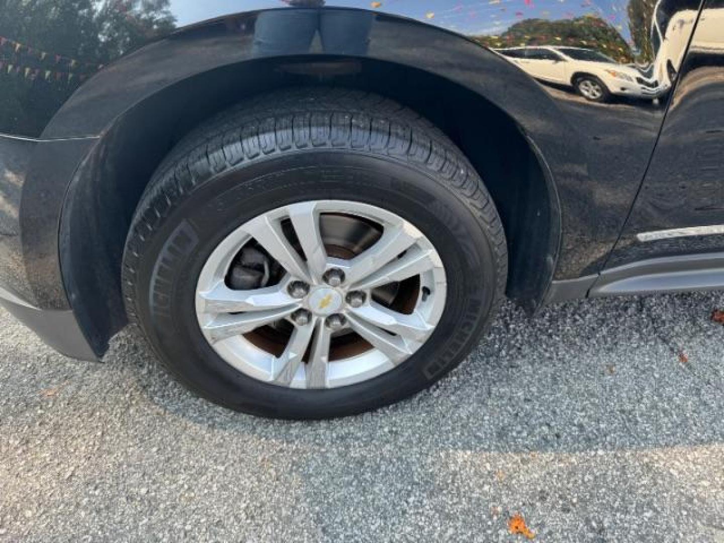 2014 Black Chevrolet Equinox 1LT 2WD (2GNALBEK9E1) with an 2.4L L4 DOHC 16V FFV engine, 6-Speed Automatic transmission, located at 1806 Veterans Memorial Hwy SW, Austell, GA, 30168, (770) 944-9558, 33.817959, -84.606987 - Photo#18