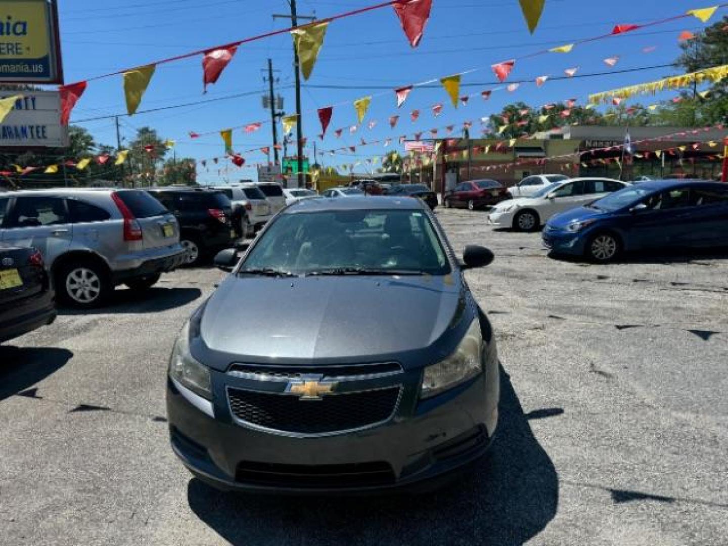 2013 Gray Chevrolet Cruze LS Auto (1G1PA5SH8D7) with an 1.8L L4 DOHC 16V FFV engine, 6-Speed Automatic transmission, located at 1806 Veterans Memorial Hwy SW, Austell, GA, 30168, (770) 944-9558, 33.817959, -84.606987 - Photo#1