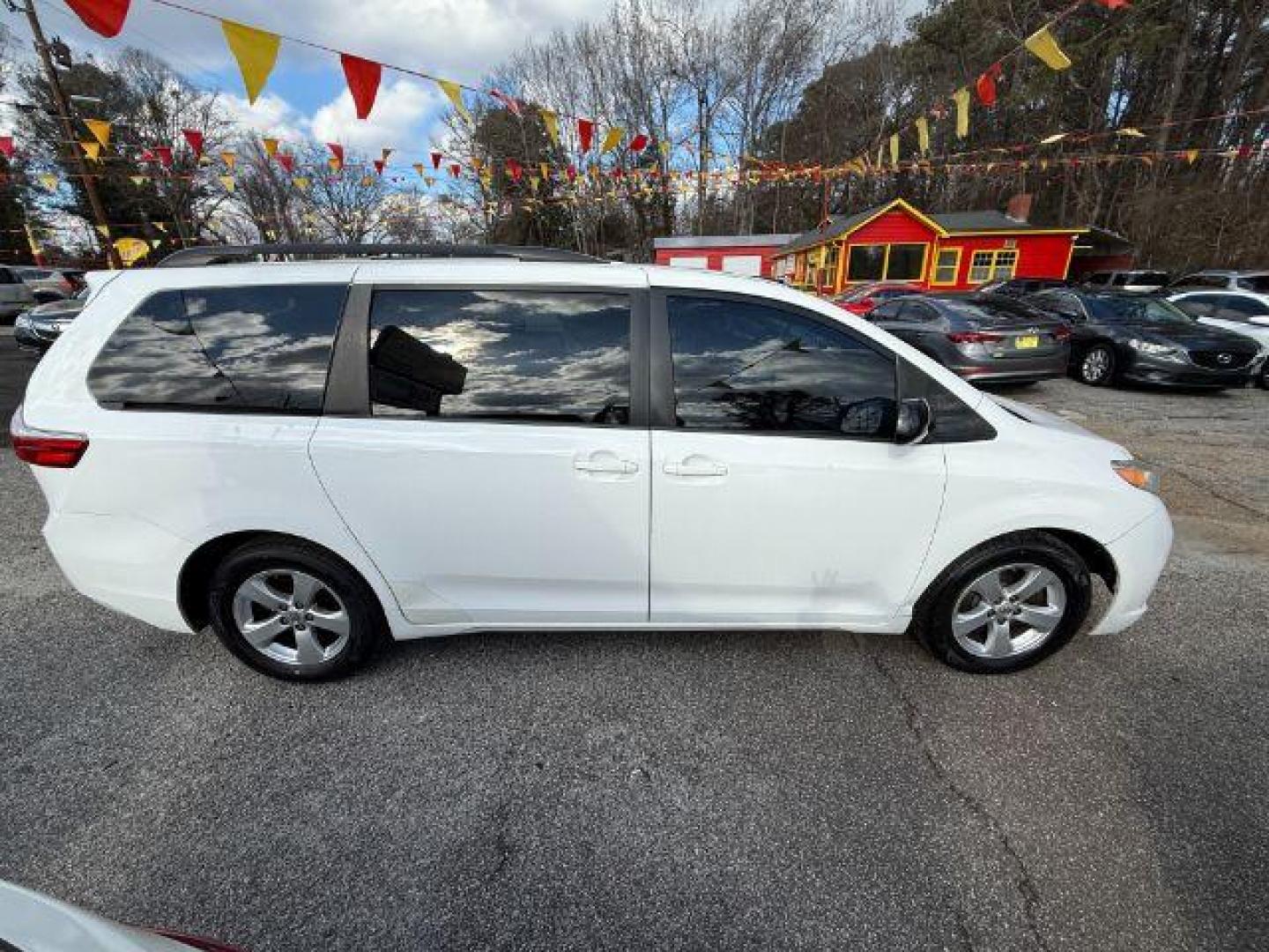 2016 White Toyota Sienna LE FWD 8-Passenger V6 (5TDKK3DC3GS) with an 3.5L V6 EFI DOHC 24V engine, 5-Speed Automatic transmission, located at 1806 Veterans Memorial Hwy SW, Austell, GA, 30168, (770) 944-9558, 33.817959, -84.606987 - Photo#8