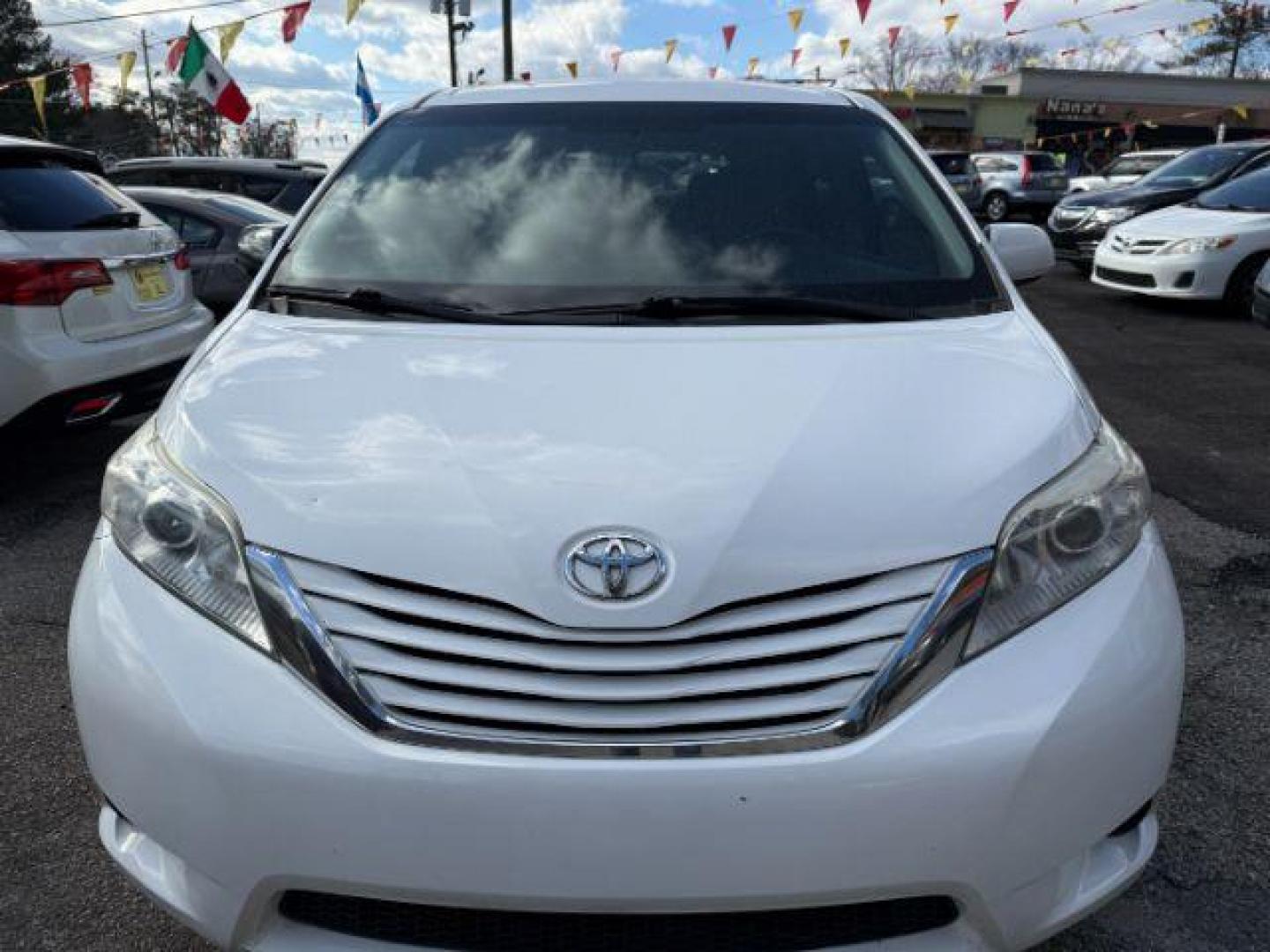 2016 White Toyota Sienna LE FWD 8-Passenger V6 (5TDKK3DC3GS) with an 3.5L V6 EFI DOHC 24V engine, 5-Speed Automatic transmission, located at 1806 Veterans Memorial Hwy SW, Austell, GA, 30168, (770) 944-9558, 33.817959, -84.606987 - Photo#12