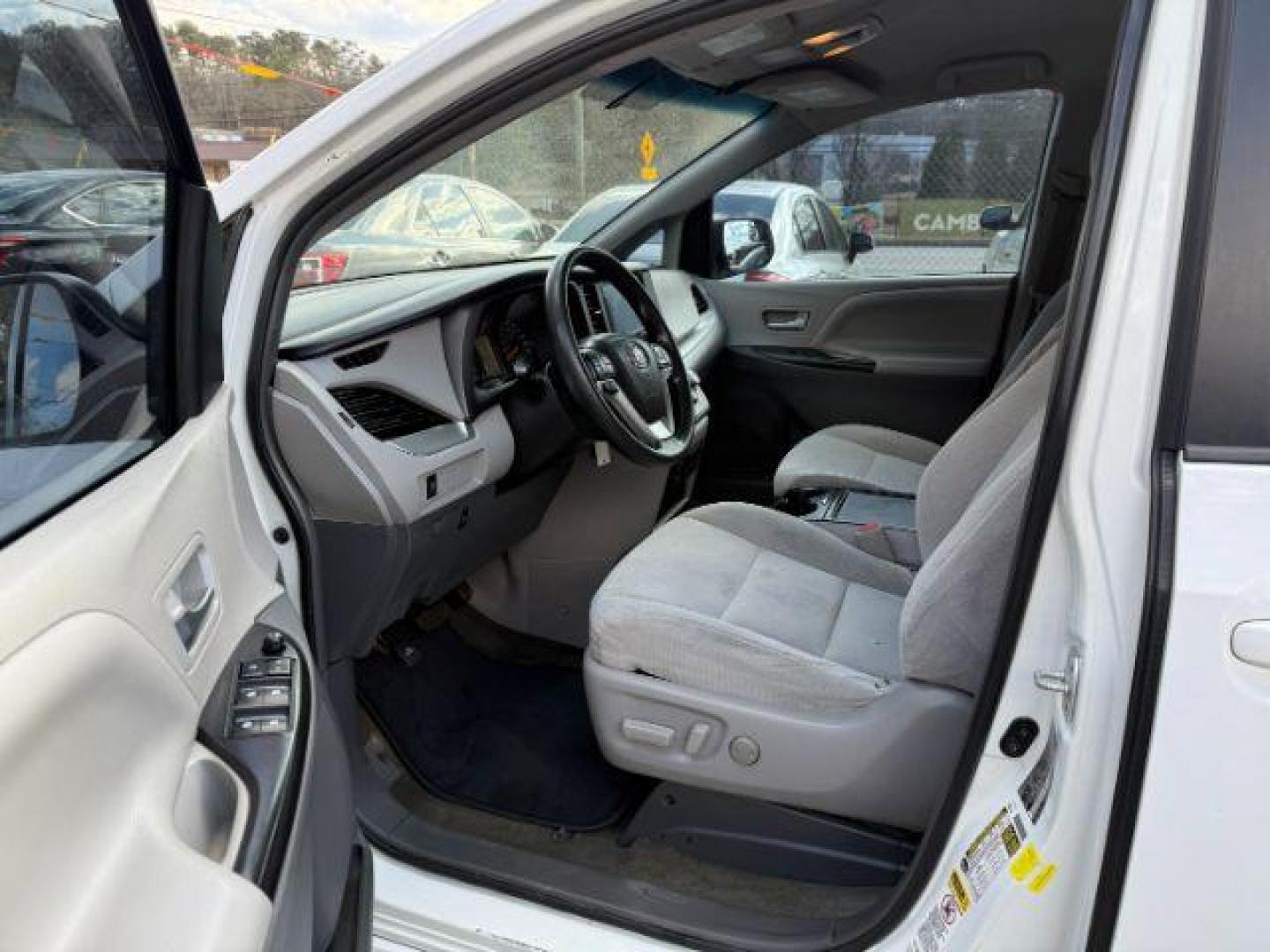 2016 White Toyota Sienna LE FWD 8-Passenger V6 (5TDKK3DC3GS) with an 3.5L V6 EFI DOHC 24V engine, 5-Speed Automatic transmission, located at 1806 Veterans Memorial Hwy SW, Austell, GA, 30168, (770) 944-9558, 33.817959, -84.606987 - Photo#13