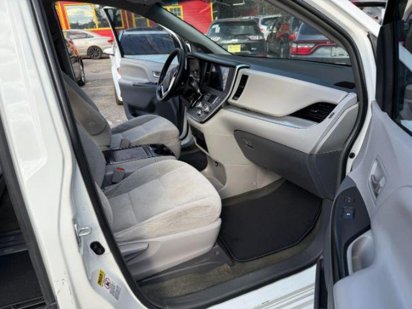 2016 White Toyota Sienna LE FWD 8-Passenger V6 (5TDKK3DC3GS) with an 3.5L V6 EFI DOHC 24V engine, 5-Speed Automatic transmission, located at 1806 Veterans Memorial Hwy SW, Austell, GA, 30168, (770) 944-9558, 33.817959, -84.606987 - Photo#20