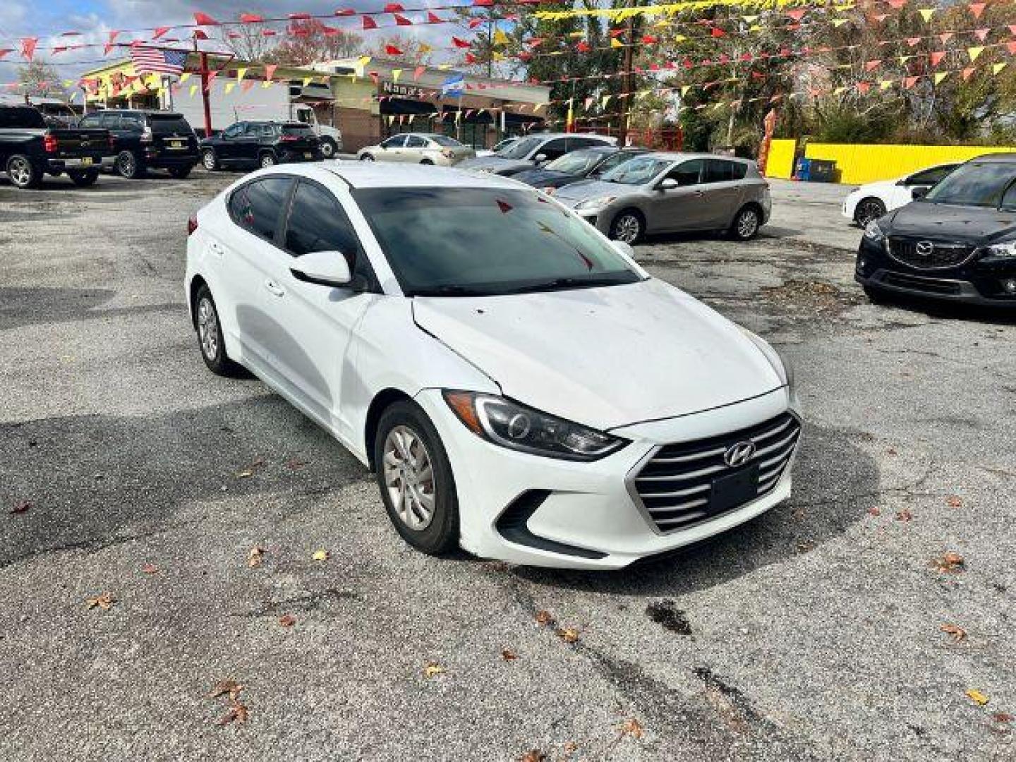 2017 White Hyundai Elantra SE 6AT (5NPD74LF5HH) with an 1.8L L4 DOHC 16V engine, 6-Speed Automatic transmission, located at 1806 Veterans Memorial Hwy SW, Austell, GA, 30168, (770) 944-9558, 33.817959, -84.606987 - Photo#0