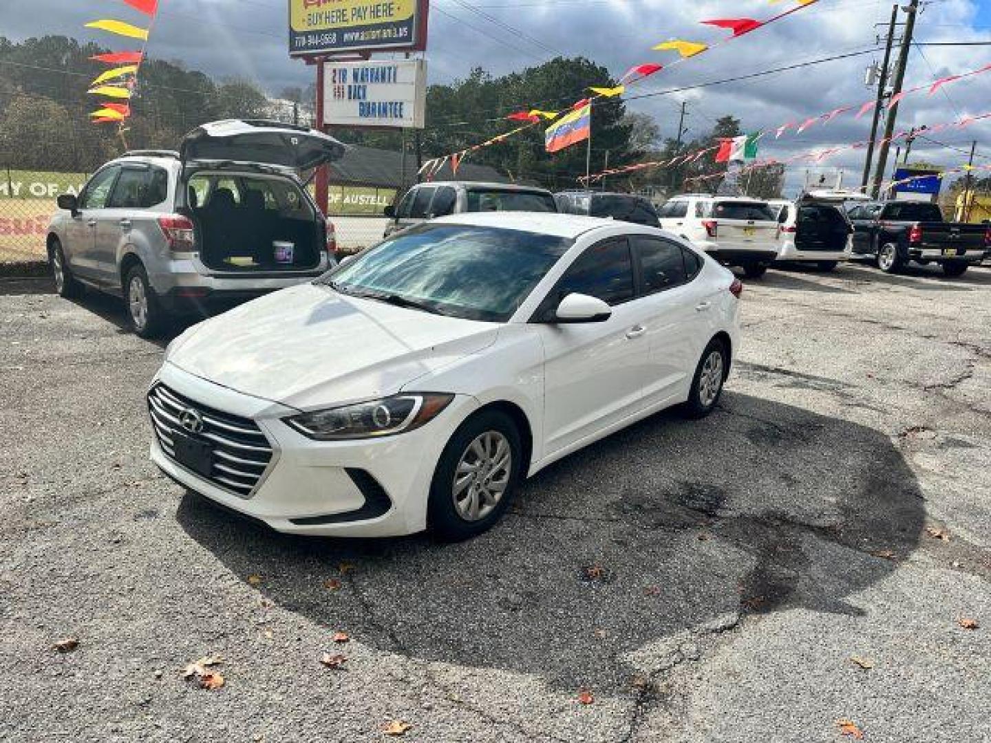 2017 White Hyundai Elantra SE 6AT (5NPD74LF5HH) with an 1.8L L4 DOHC 16V engine, 6-Speed Automatic transmission, located at 1806 Veterans Memorial Hwy SW, Austell, GA, 30168, (770) 944-9558, 33.817959, -84.606987 - Photo#1