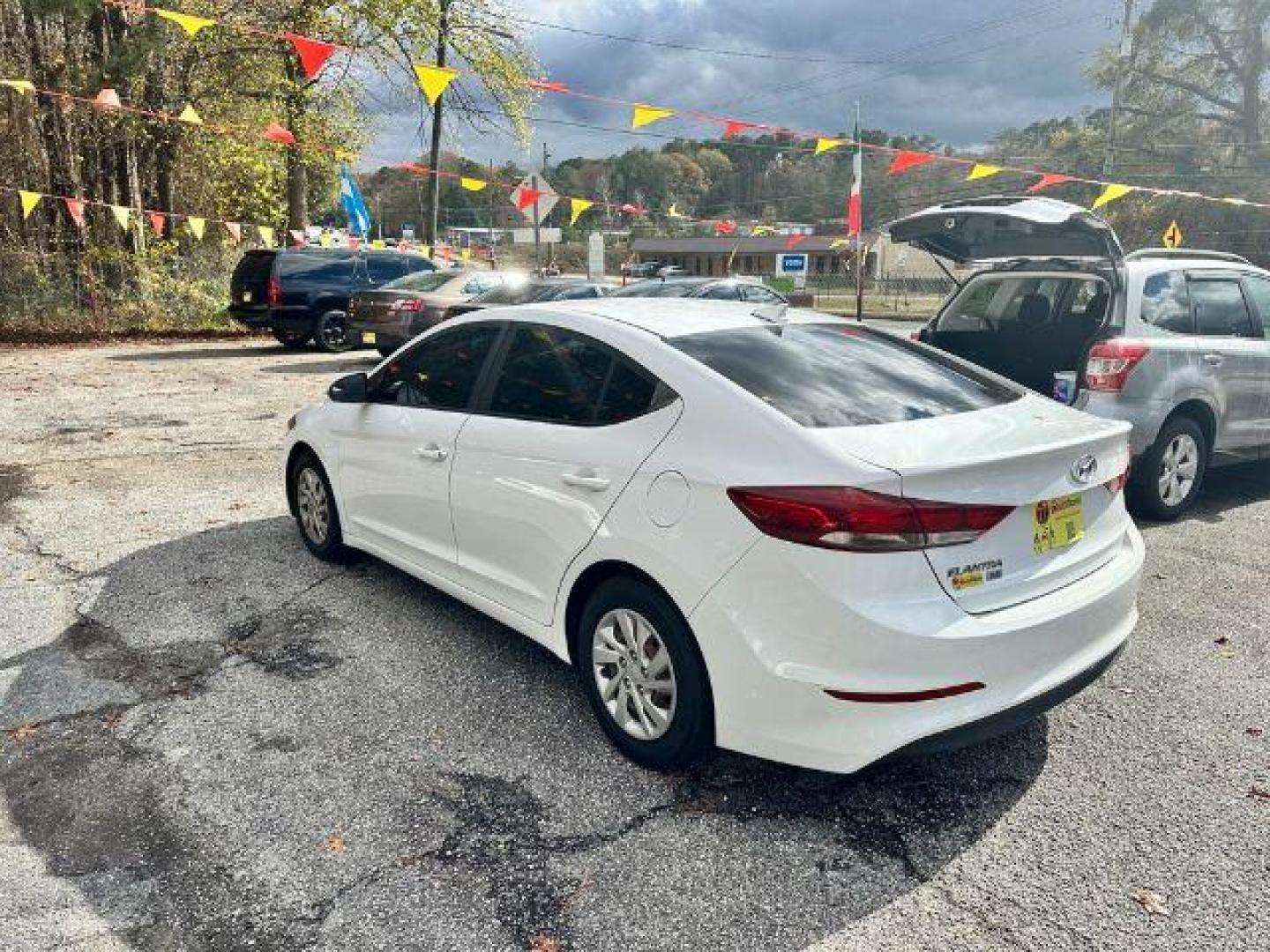 2017 White Hyundai Elantra SE 6AT (5NPD74LF5HH) with an 1.8L L4 DOHC 16V engine, 6-Speed Automatic transmission, located at 1806 Veterans Memorial Hwy SW, Austell, GA, 30168, (770) 944-9558, 33.817959, -84.606987 - Photo#3