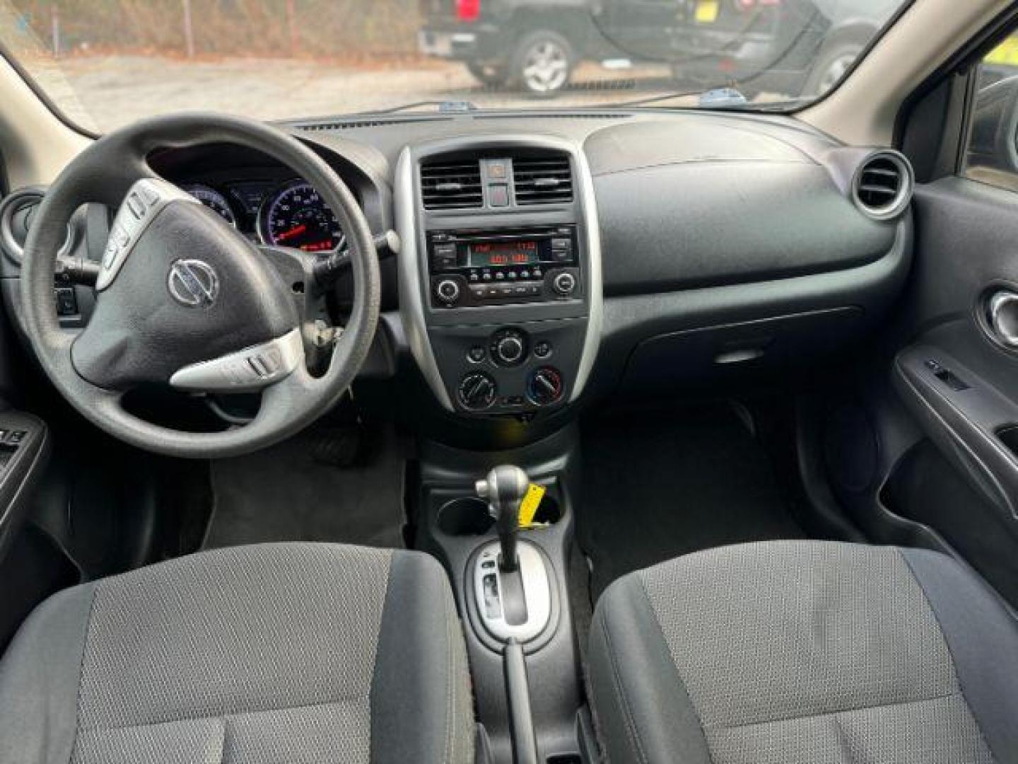 2016 Black Nissan Versa 1.6 SV Sedan (3N1CN7AP3GL) with an 1.6L L4 DOHC 16V engine, Continuously Variable Transmission transmission, located at 1806 Veterans Memorial Hwy SW, Austell, GA, 30168, (770) 944-9558, 33.817959, -84.606987 - Photo#4