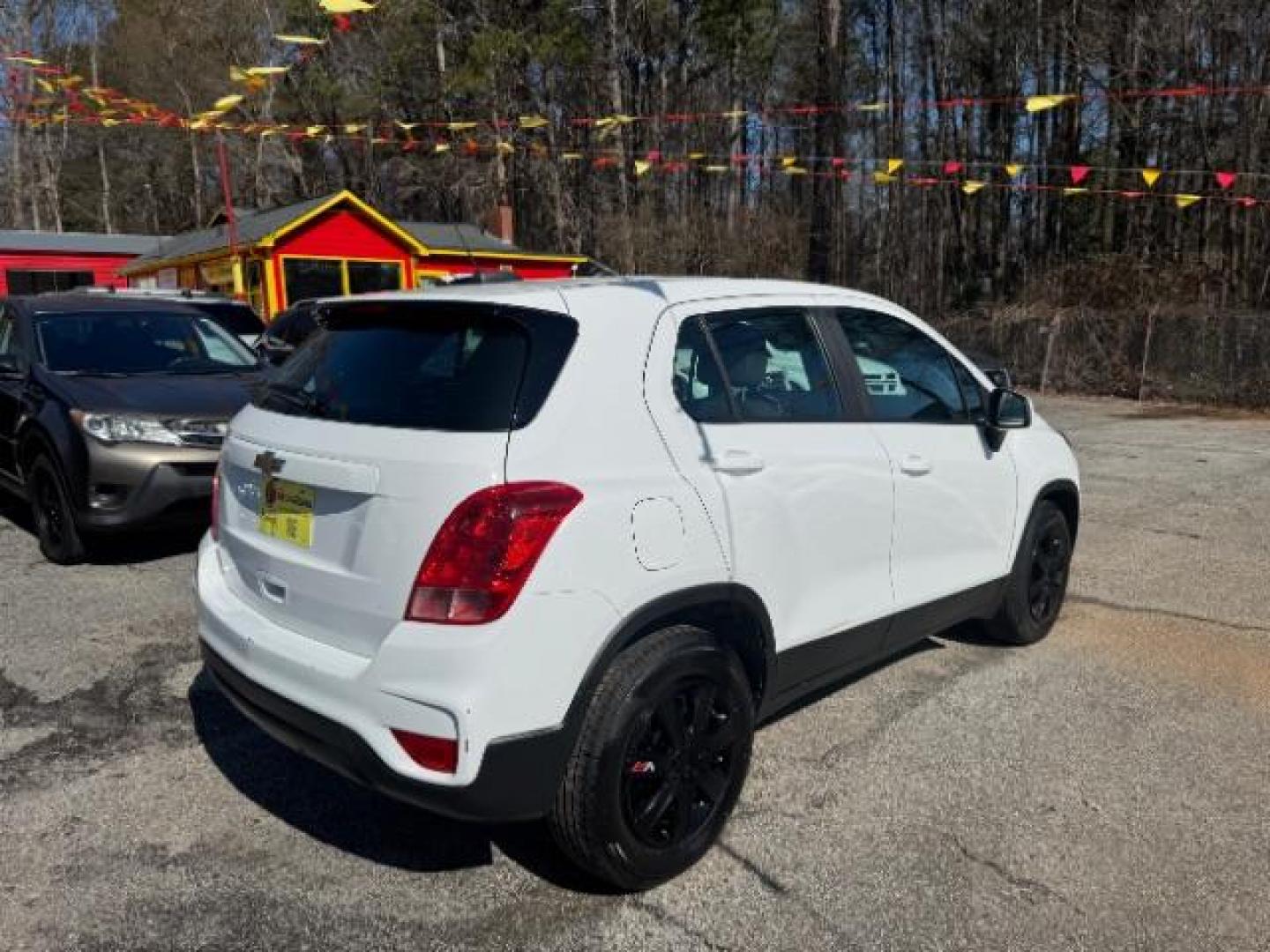 2017 White Chevrolet Trax LS FWD (KL7CJKSB8HB) with an 1.4L L4 DOHC 16V engine, 6-Speed Automatic transmission, located at 1806 Veterans Memorial Hwy SW, Austell, GA, 30168, (770) 944-9558, 33.817959, -84.606987 - Photo#3