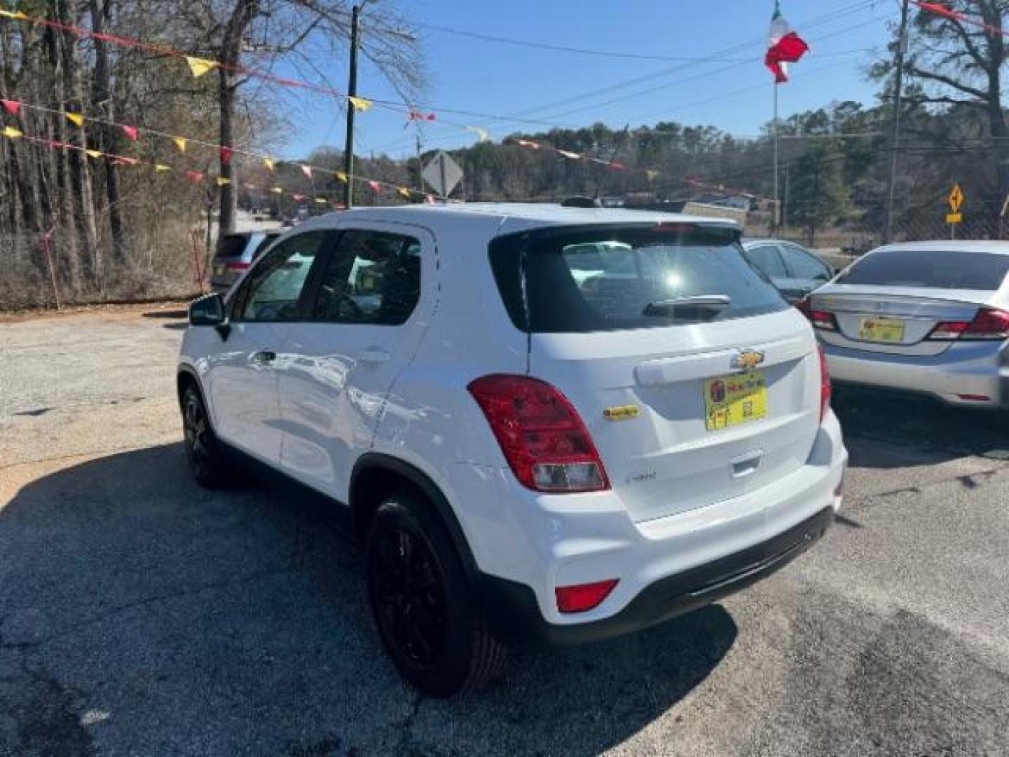 2017 White Chevrolet Trax LS FWD (KL7CJKSB8HB) with an 1.4L L4 DOHC 16V engine, 6-Speed Automatic transmission, located at 1806 Veterans Memorial Hwy SW, Austell, GA, 30168, (770) 944-9558, 33.817959, -84.606987 - Photo#5