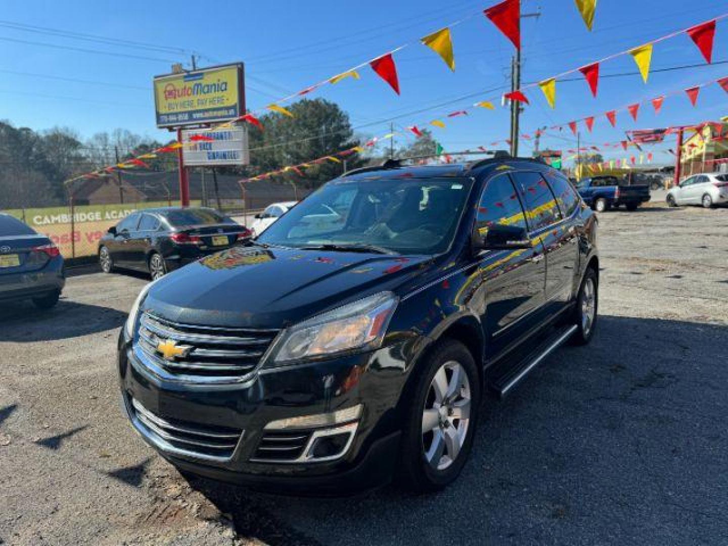 2013 BLACK Chevrolet Traverse LTZ FWD (1GNKRLKD1DJ) with an 3.6L V6 DOHC 24V engine, 6-Speed Automatic transmission, located at 1806 Veterans Memorial Hwy SW, Austell, GA, 30168, (770) 944-9558, 33.817959, -84.606987 - Photo#0