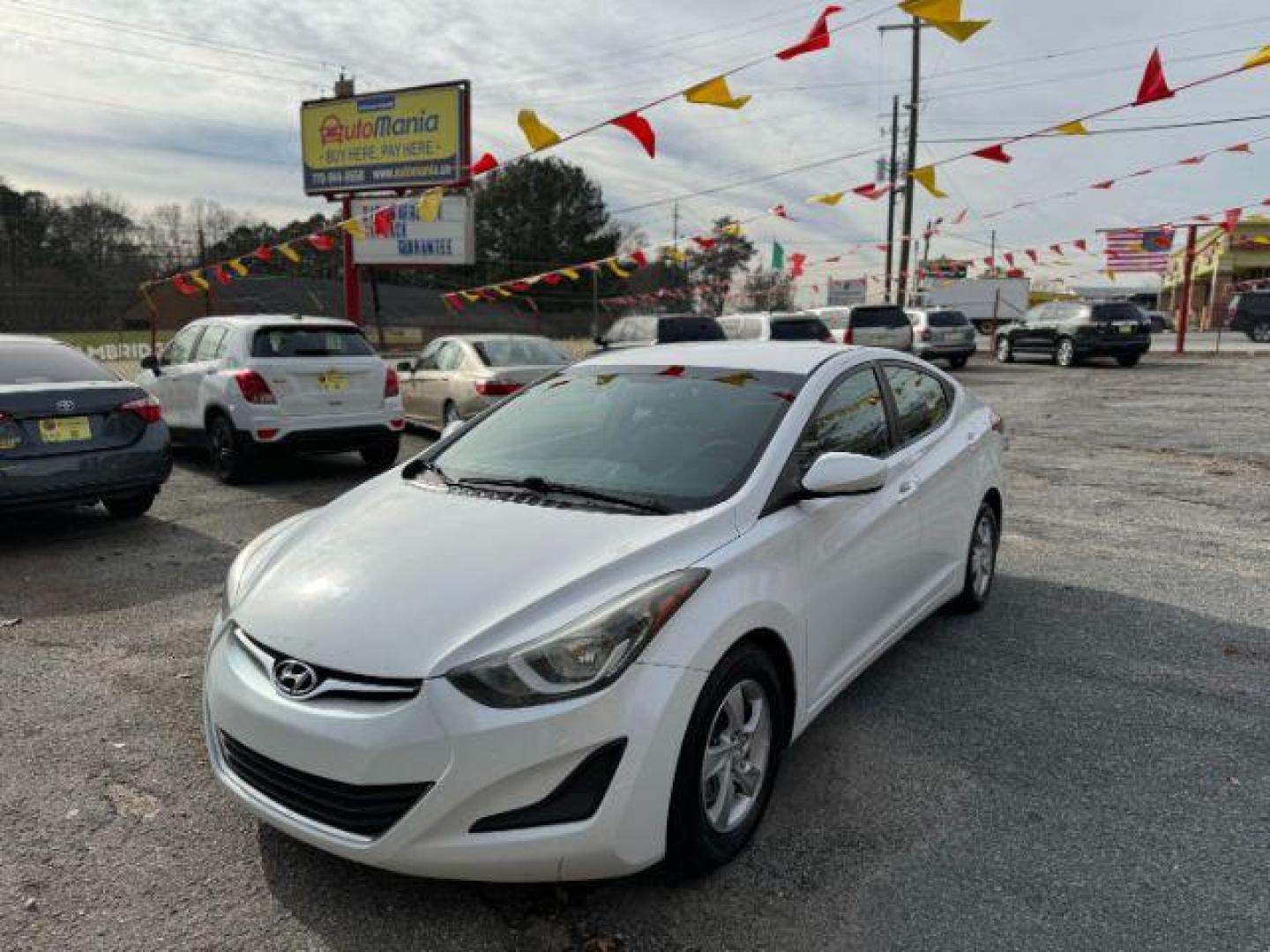 2015 White Hyundai Elantra SE 6AT (5NPDH4AE4FH) with an 1.8L L4 DOHC 16V engine, 6-Speed Automatic transmission, located at 1806 Veterans Memorial Hwy SW, Austell, GA, 30168, (770) 944-9558, 33.817959, -84.606987 - Photo#0