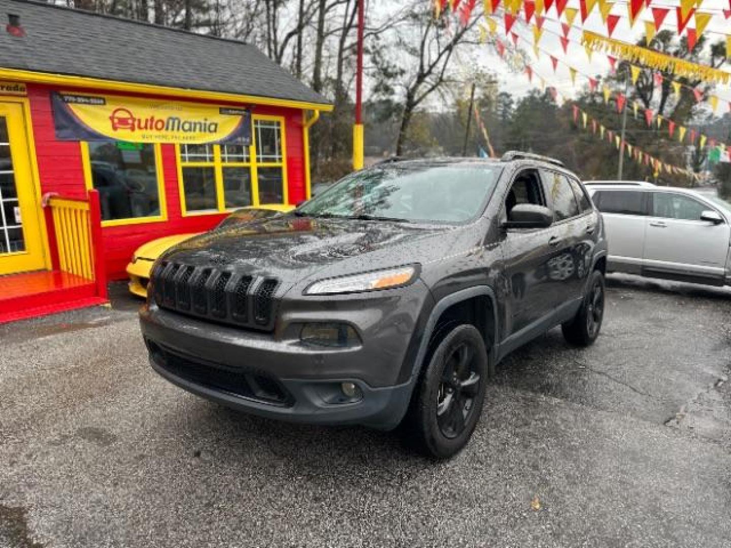 2015 Gray Jeep Cherokee Latitude 4WD (1C4PJMCBXFW) with an 2.4L L4 DOHC 16V engine, 9-Speed Automatic transmission, located at 1806 Veterans Memorial Hwy SW, Austell, GA, 30168, (770) 944-9558, 33.817959, -84.606987 - Photo#0