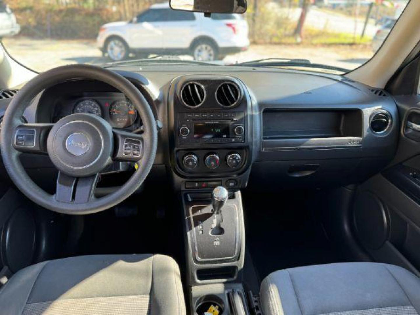 2015 Black Jeep Patriot Sport 2WD (1C4NJPBB7FD) with an 2.4L L4 DOHC 16V engine, located at 1806 Veterans Memorial Hwy SW, Austell, GA, 30168, (770) 944-9558, 33.817959, -84.606987 - Photo#10