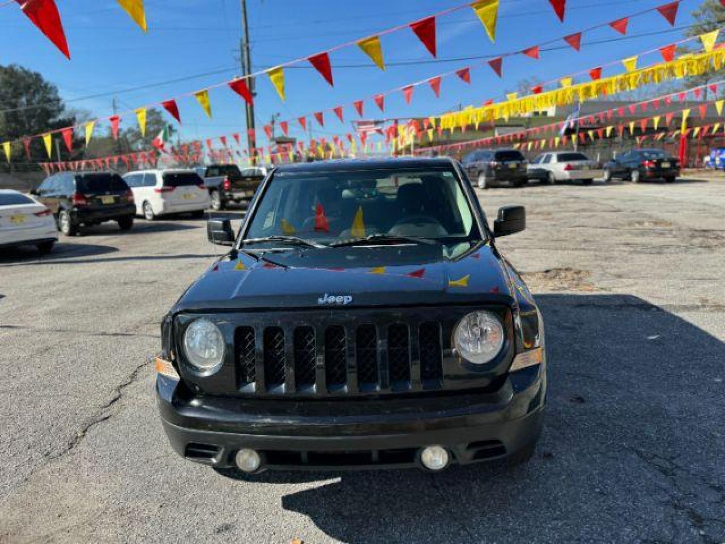 2015 Black Jeep Patriot Sport 2WD (1C4NJPBB7FD) with an 2.4L L4 DOHC 16V engine, located at 1806 Veterans Memorial Hwy SW, Austell, GA, 30168, (770) 944-9558, 33.817959, -84.606987 - Photo#1