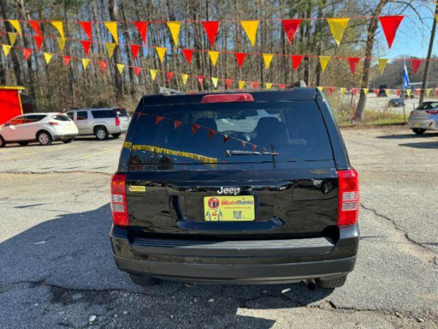 2015 Black Jeep Patriot Sport 2WD (1C4NJPBB7FD) with an 2.4L L4 DOHC 16V engine, located at 1806 Veterans Memorial Hwy SW, Austell, GA, 30168, (770) 944-9558, 33.817959, -84.606987 - Photo#3