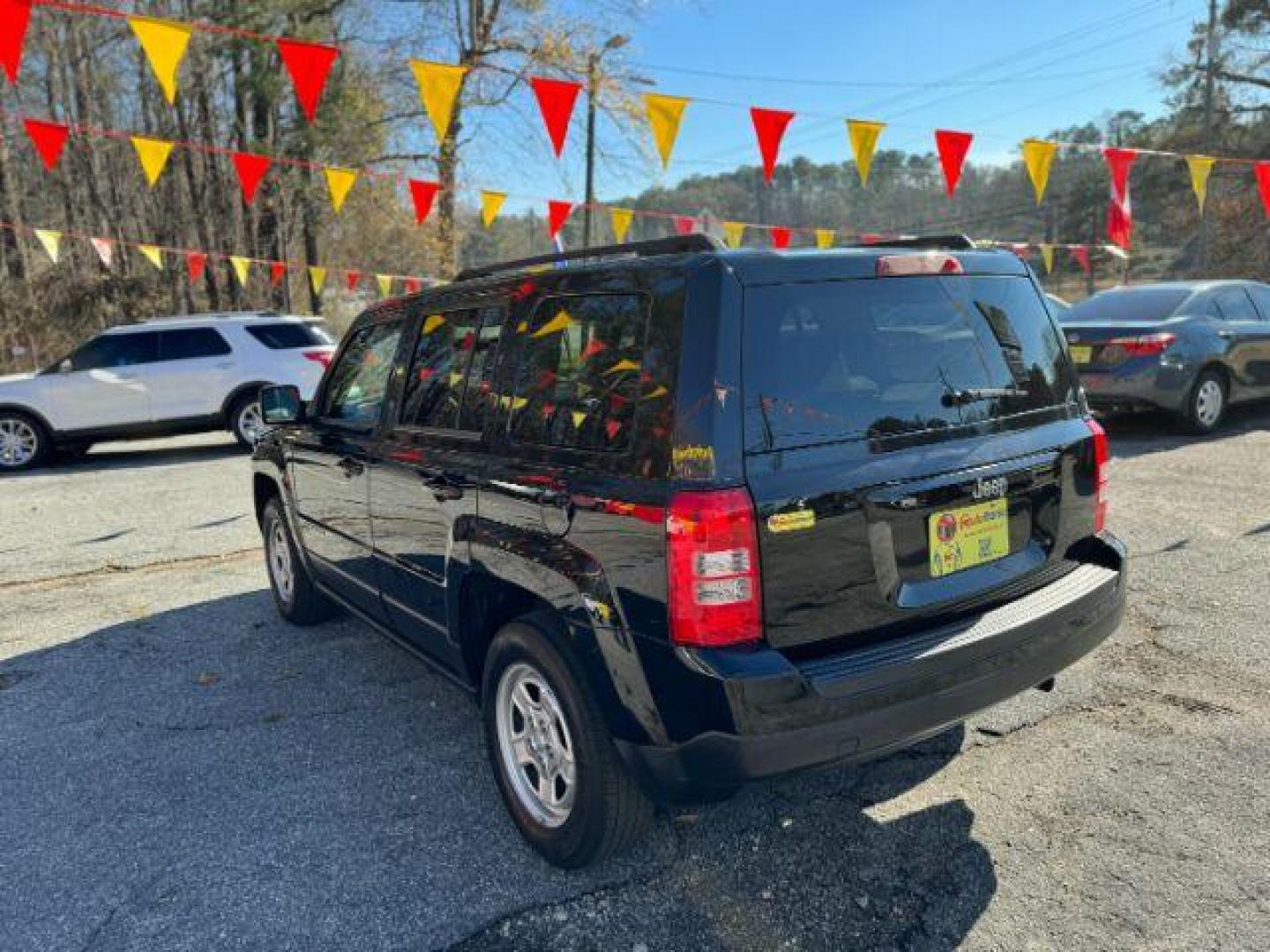 2015 Black Jeep Patriot Sport 2WD (1C4NJPBB7FD) with an 2.4L L4 DOHC 16V engine, located at 1806 Veterans Memorial Hwy SW, Austell, GA, 30168, (770) 944-9558, 33.817959, -84.606987 - Photo#4