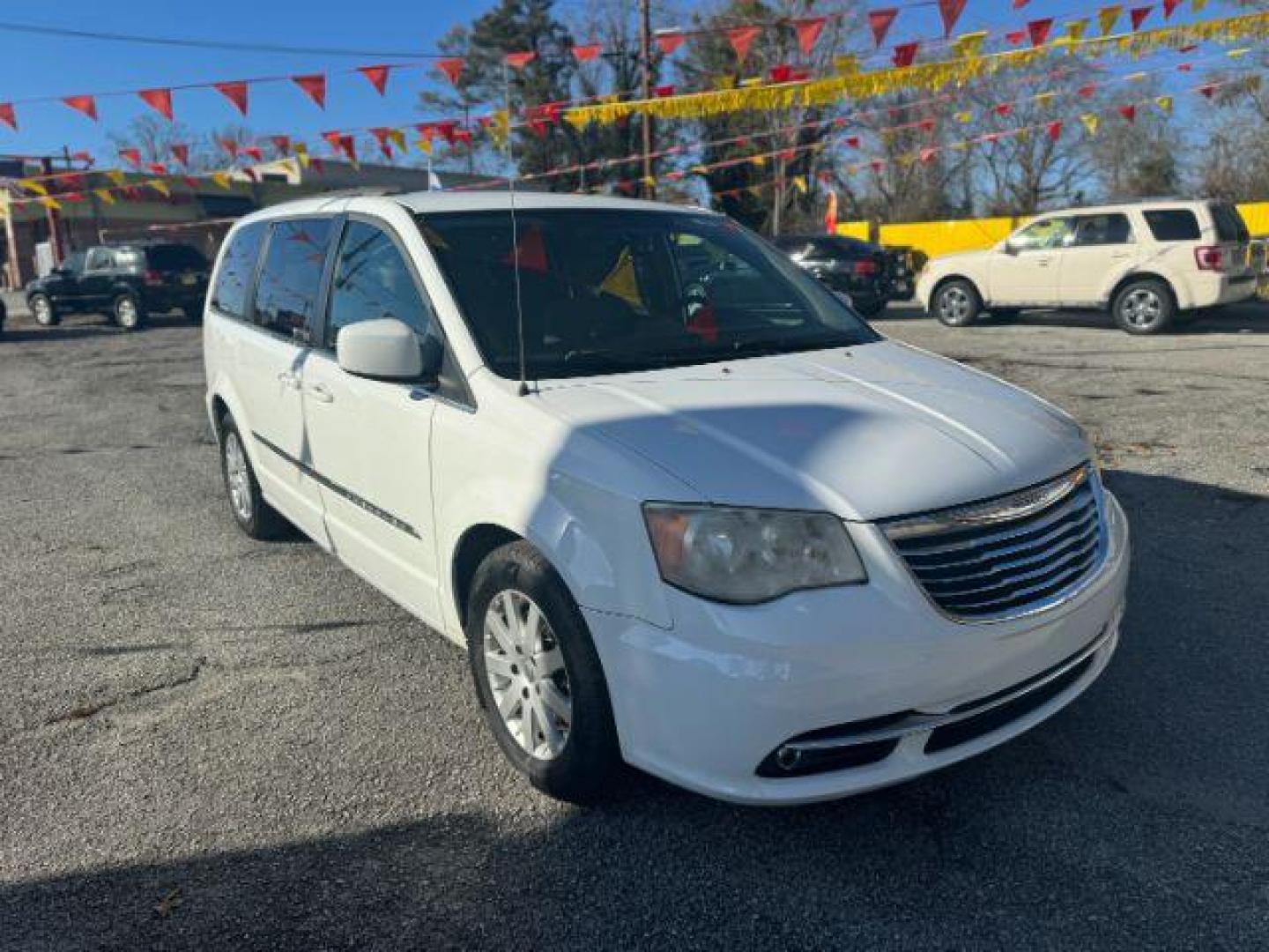 2014 White Chrysler Town and Country Touring (2C4RC1BG8ER) with an 3.6L V6 DOHC 24V engine, 6-Speed Automatic transmission, located at 1806 Veterans Memorial Hwy SW, Austell, GA, 30168, (770) 944-9558, 33.817959, -84.606987 - Photo#1