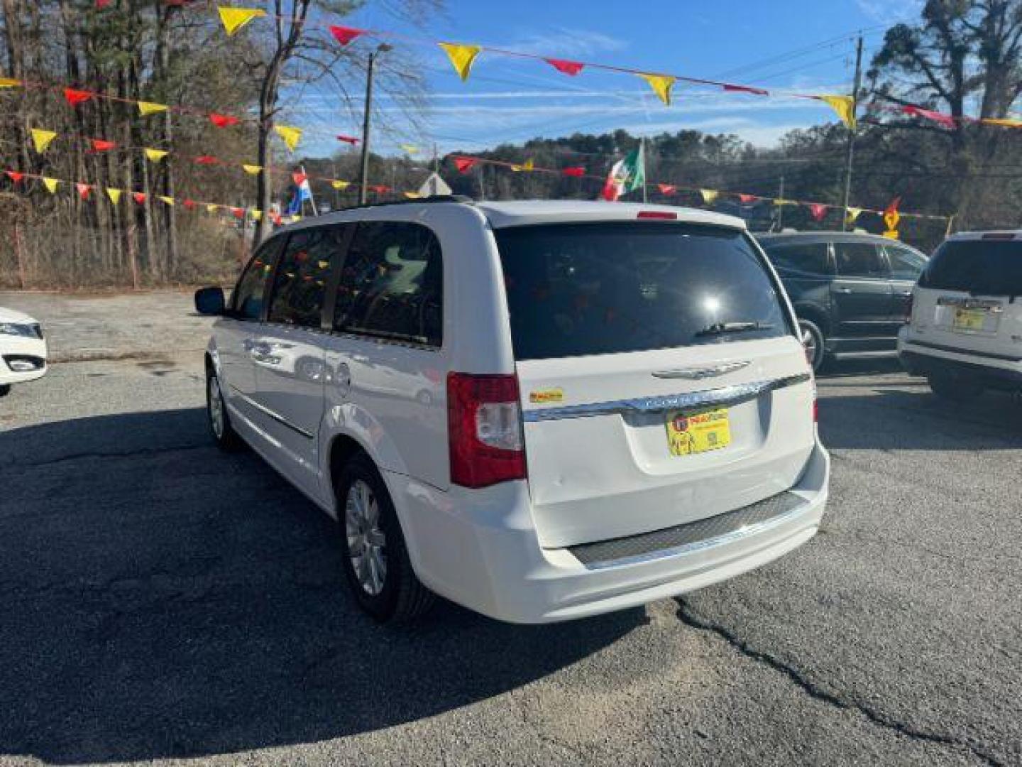 2014 White Chrysler Town and Country Touring (2C4RC1BG8ER) with an 3.6L V6 DOHC 24V engine, 6-Speed Automatic transmission, located at 1806 Veterans Memorial Hwy SW, Austell, GA, 30168, (770) 944-9558, 33.817959, -84.606987 - Photo#2