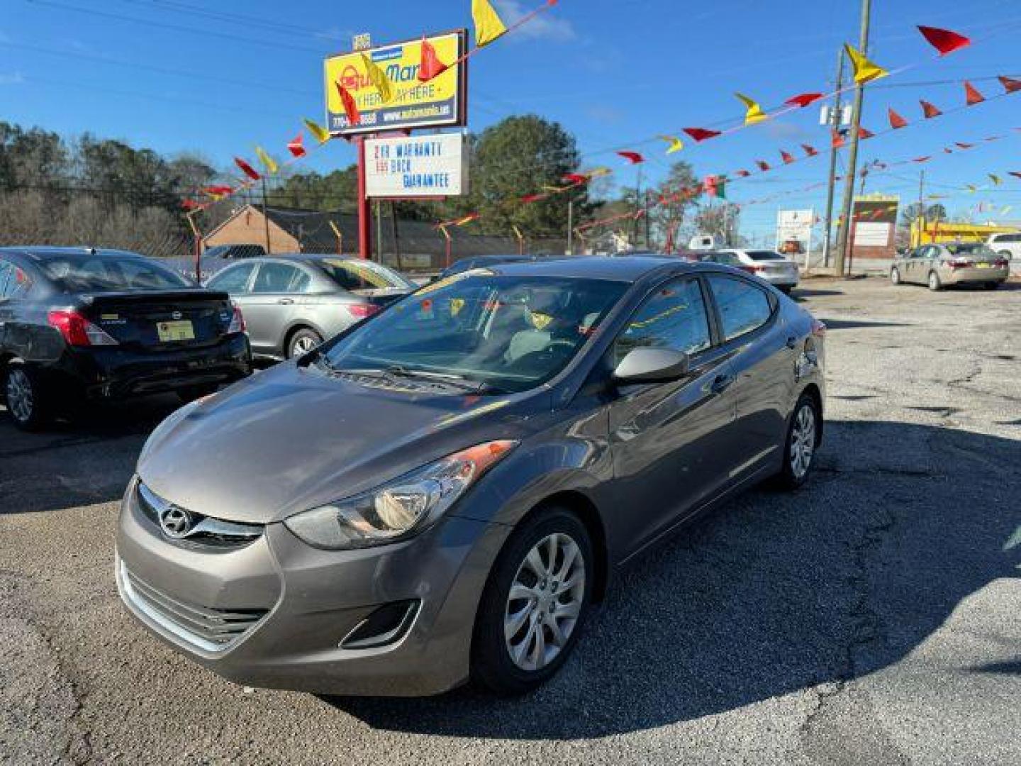 2012 Gray Hyundai Elantra GLS A/T (5NPDH4AE2CH) with an 1.8L L4 DOHC 16V engine, 6-Speed Automatic transmission, located at 1806 Veterans Memorial Hwy SW, Austell, GA, 30168, (770) 944-9558, 33.817959, -84.606987 - Photo#0