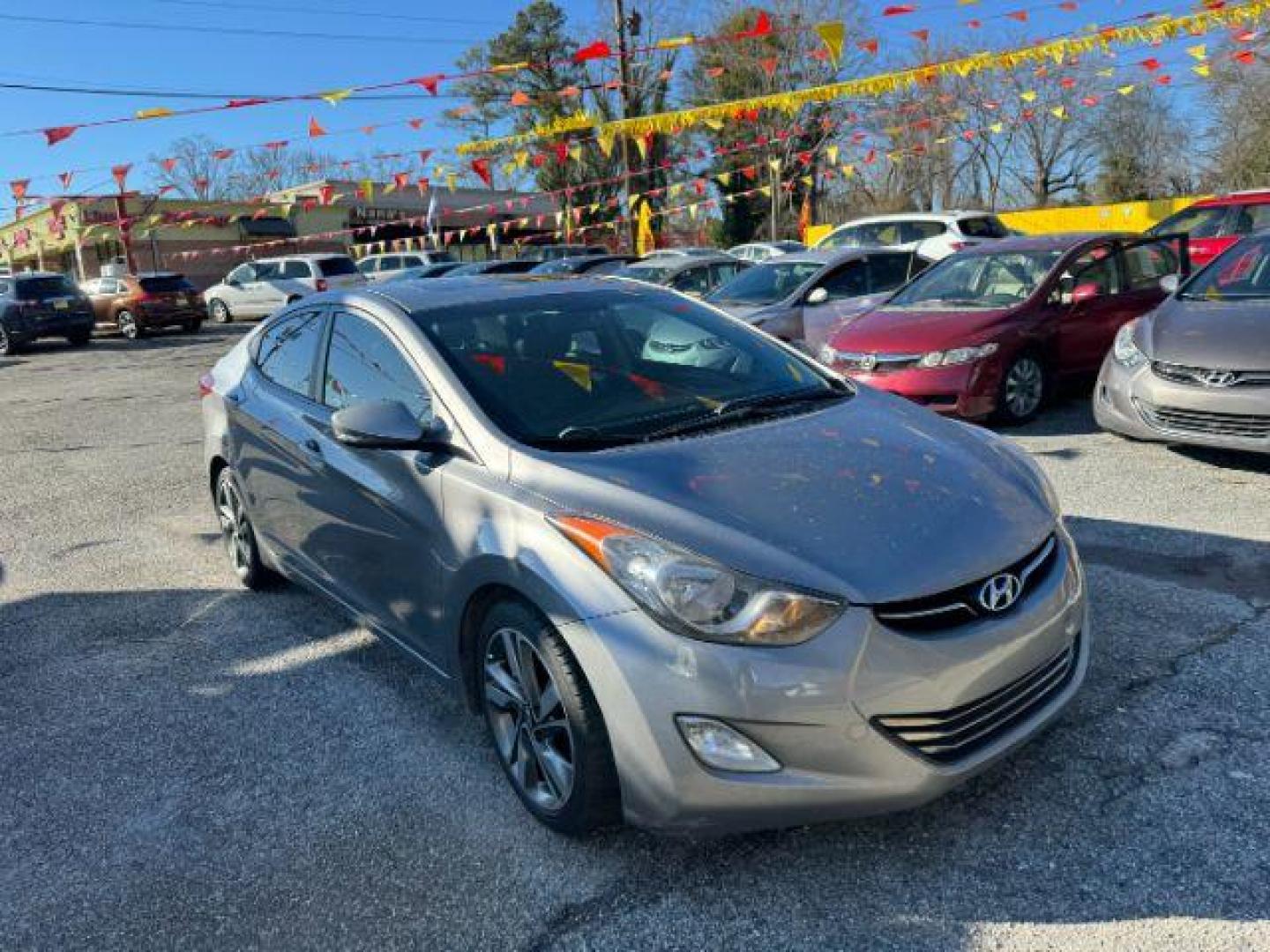 2012 Gray Hyundai Elantra Limited (KMHDH4AEXCU) with an 1.8L L4 DOHC 16V engine, 6-Speed Automatic transmission, located at 1806 Veterans Memorial Hwy SW, Austell, GA, 30168, (770) 944-9558, 33.817959, -84.606987 - Photo#2