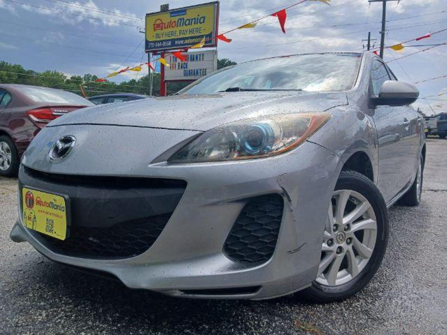 2012 Silver Mazda MAZDA3 i Touring 4-Door (JM1BL1V77C1) with an 2.0L L4 DOHC 16V engine, located at 1806 Veterans Memorial Hwy SW, Austell, GA, 30168, (770) 944-9558, 33.817959, -84.606987 - Photo#0