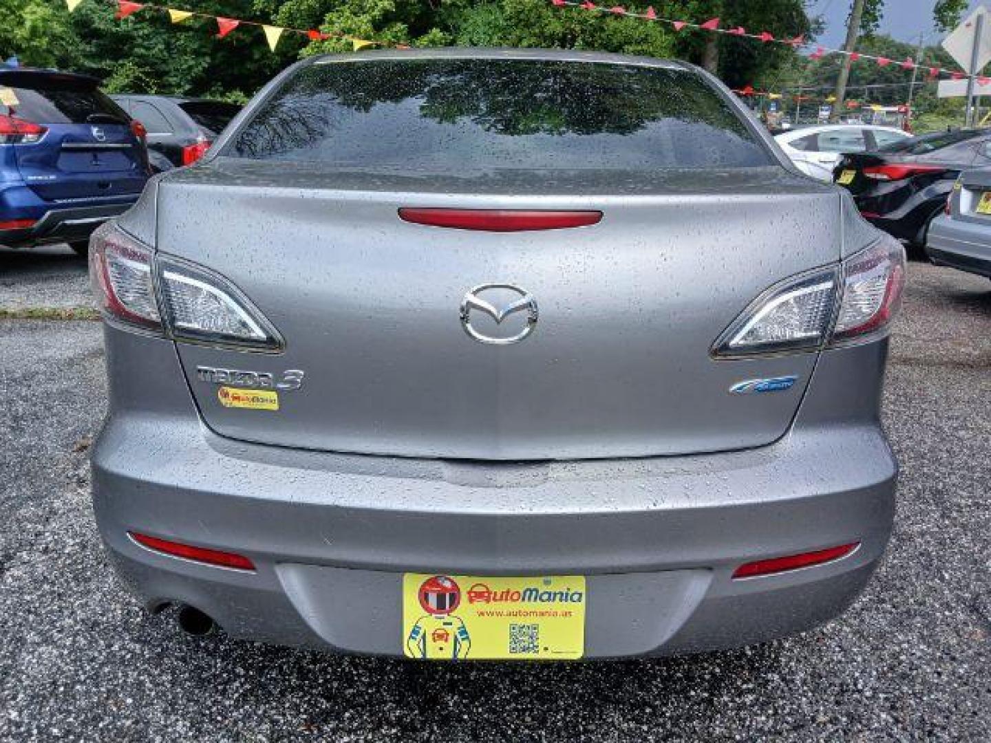 2012 Silver Mazda MAZDA3 i Touring 4-Door (JM1BL1V77C1) with an 2.0L L4 DOHC 16V engine, located at 1806 Veterans Memorial Hwy SW, Austell, GA, 30168, (770) 944-9558, 33.817959, -84.606987 - Photo#3