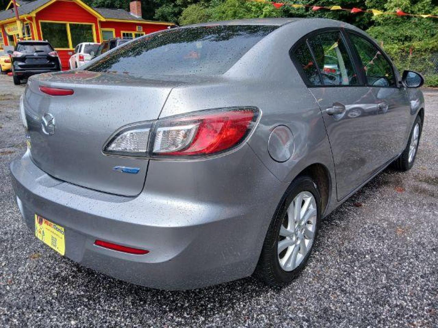 2012 Silver Mazda MAZDA3 i Touring 4-Door (JM1BL1V77C1) with an 2.0L L4 DOHC 16V engine, located at 1806 Veterans Memorial Hwy SW, Austell, GA, 30168, (770) 944-9558, 33.817959, -84.606987 - Photo#5