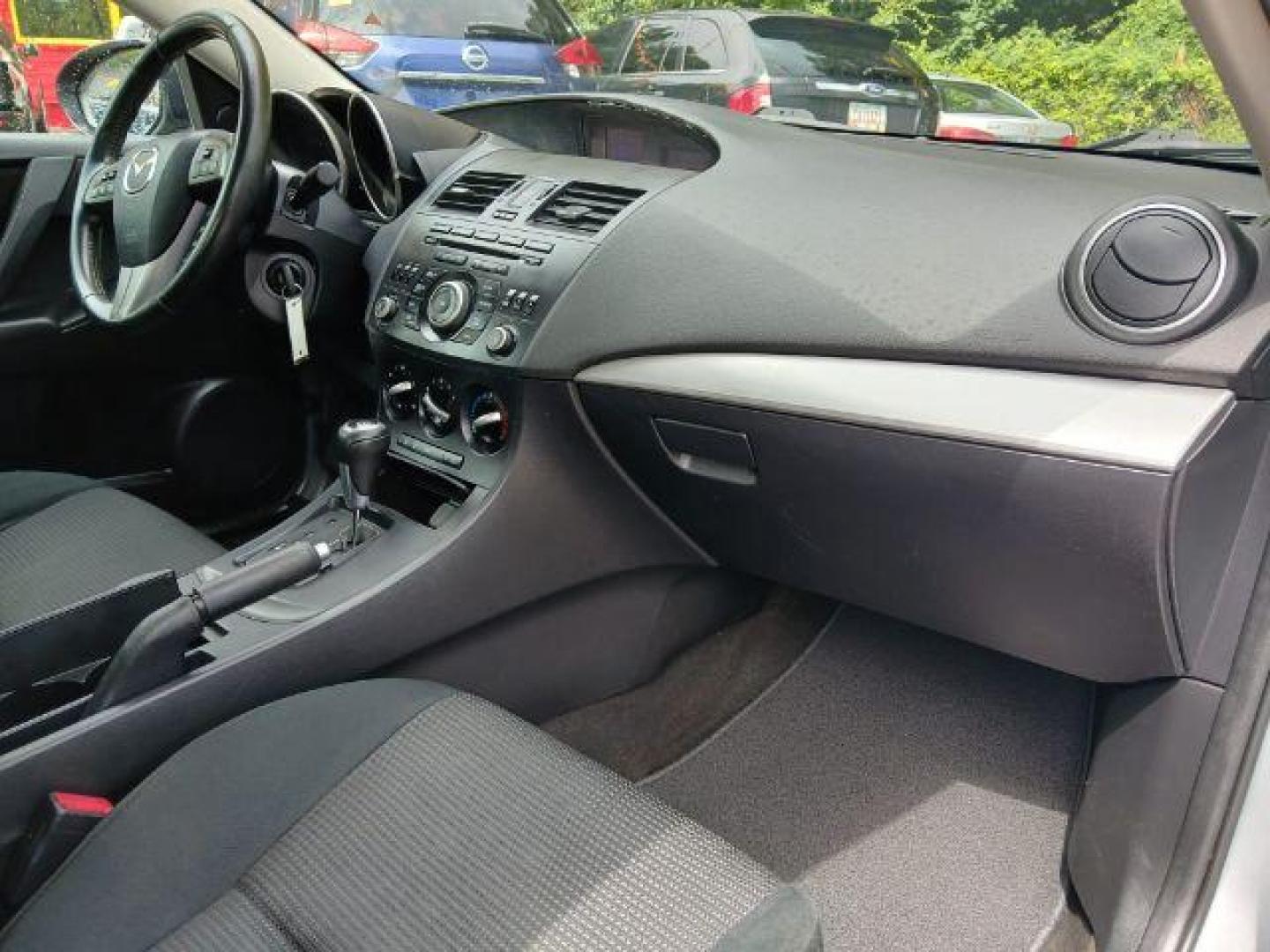 2012 Silver Mazda MAZDA3 i Touring 4-Door (JM1BL1V77C1) with an 2.0L L4 DOHC 16V engine, located at 1806 Veterans Memorial Hwy SW, Austell, GA, 30168, (770) 944-9558, 33.817959, -84.606987 - Photo#7