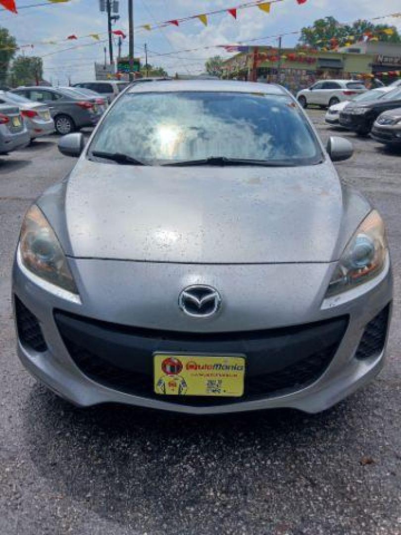 2012 Silver Mazda MAZDA3 i Touring 4-Door (JM1BL1V77C1) with an 2.0L L4 DOHC 16V engine, located at 1806 Veterans Memorial Hwy SW, Austell, GA, 30168, (770) 944-9558, 33.817959, -84.606987 - Photo#2