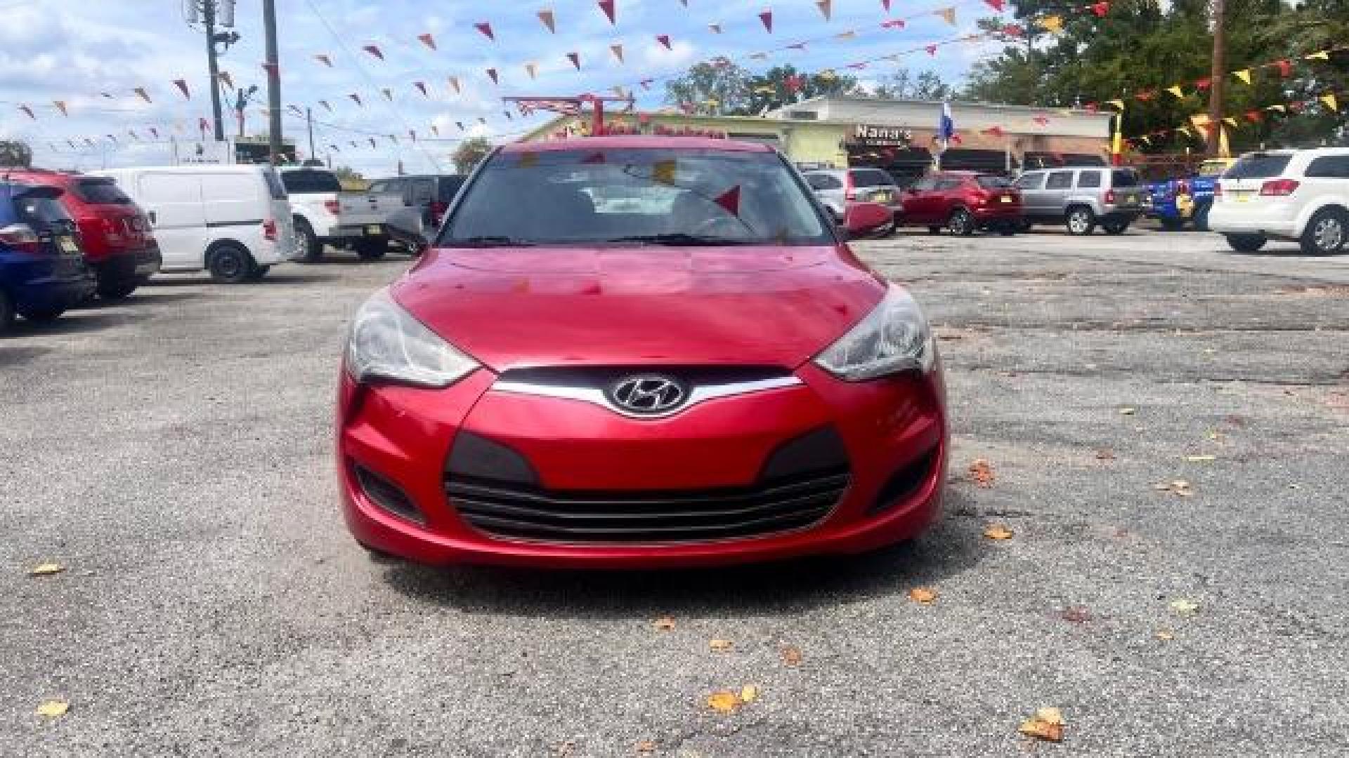 2013 Red Hyundai Veloster Base (KMHTC6ADXDU) with an 1.6L L4 DOHC 16V engine, 6-Speed Automatic transmission, located at 1806 Veterans Memorial Hwy SW, Austell, GA, 30168, (770) 944-9558, 33.817959, -84.606987 - Photo#1