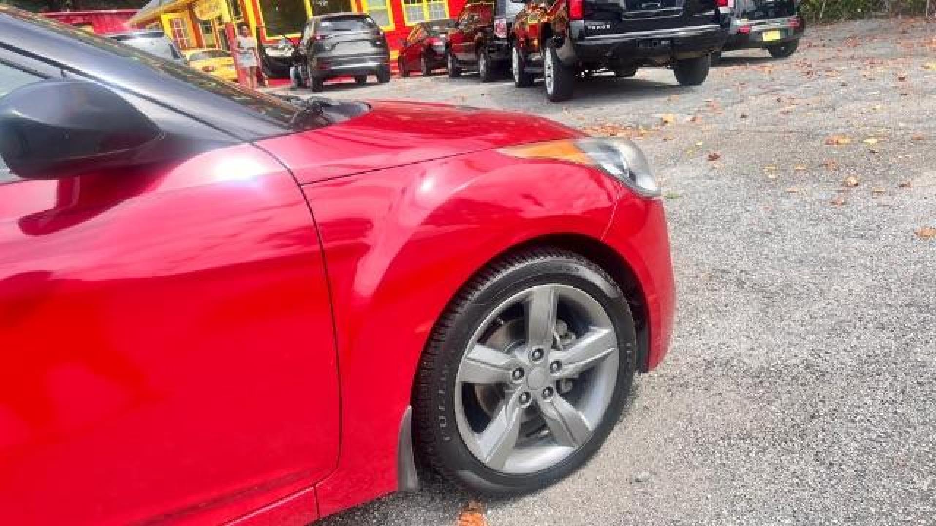 2013 Red Hyundai Veloster Base (KMHTC6ADXDU) with an 1.6L L4 DOHC 16V engine, 6-Speed Automatic transmission, located at 1806 Veterans Memorial Hwy SW, Austell, GA, 30168, (770) 944-9558, 33.817959, -84.606987 - Photo#4