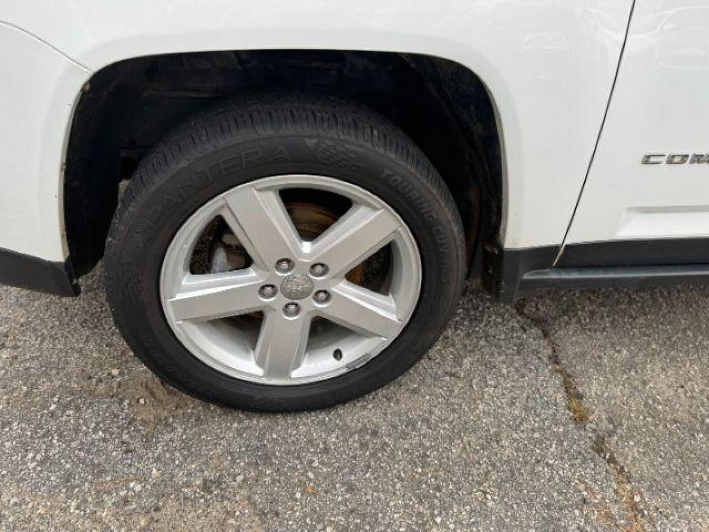 2014 White Jeep Compass Latitude FWD (1C4NJCEAXED) with an 2.0L L4 DOHC 16V engine, Continuously Variable Transmission transmission, located at 1806 Veterans Memorial Hwy SW, Austell, GA, 30168, (770) 944-9558, 33.817959, -84.606987 - Photo#16