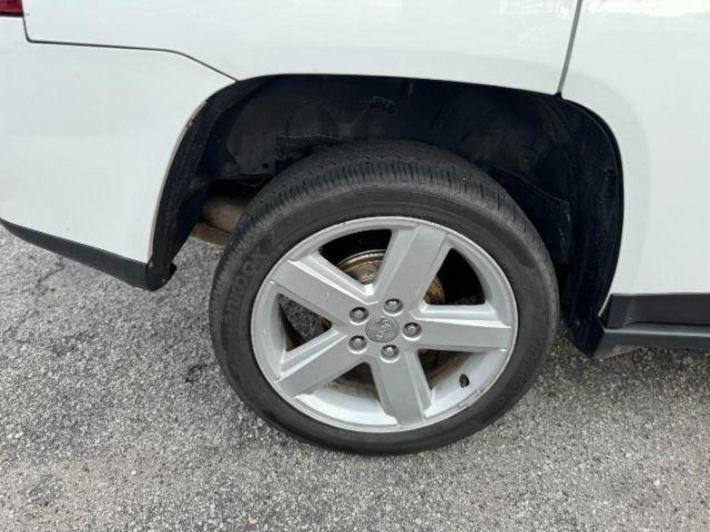 2014 White Jeep Compass Latitude FWD (1C4NJCEAXED) with an 2.0L L4 DOHC 16V engine, Continuously Variable Transmission transmission, located at 1806 Veterans Memorial Hwy SW, Austell, GA, 30168, (770) 944-9558, 33.817959, -84.606987 - Photo#20