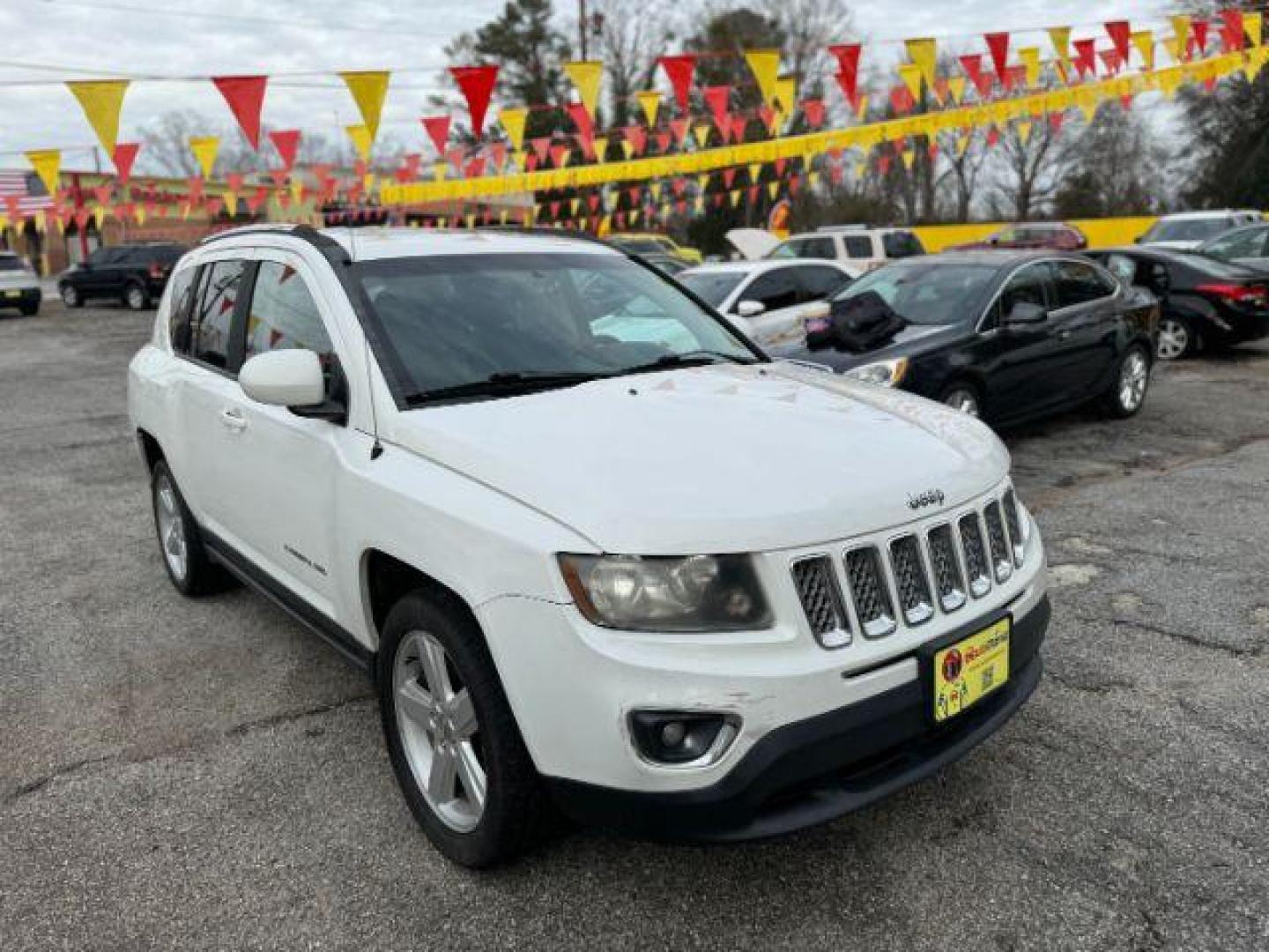 2014 White Jeep Compass Latitude FWD (1C4NJCEAXED) with an 2.0L L4 DOHC 16V engine, Continuously Variable Transmission transmission, located at 1806 Veterans Memorial Hwy SW, Austell, GA, 30168, (770) 944-9558, 33.817959, -84.606987 - Photo#2