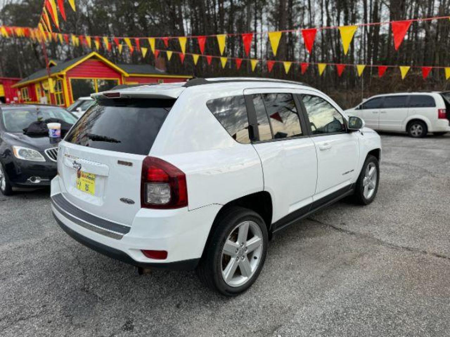 2014 White Jeep Compass Latitude FWD (1C4NJCEAXED) with an 2.0L L4 DOHC 16V engine, Continuously Variable Transmission transmission, located at 1806 Veterans Memorial Hwy SW, Austell, GA, 30168, (770) 944-9558, 33.817959, -84.606987 - Photo#3