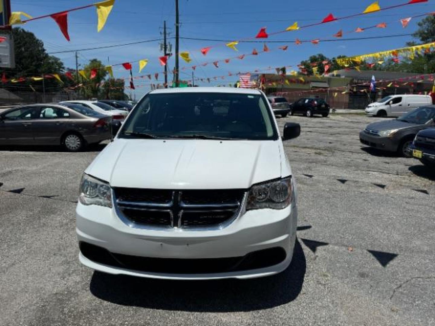 2015 White Dodge Grand Caravan SE (2C4RDGBG4FR) with an 3.6L V6 DOHC 24V engine, 6-Speed Automatic transmission, located at 1806 Veterans Memorial Hwy SW, Austell, GA, 30168, (770) 944-9558, 33.817959, -84.606987 - Photo#1