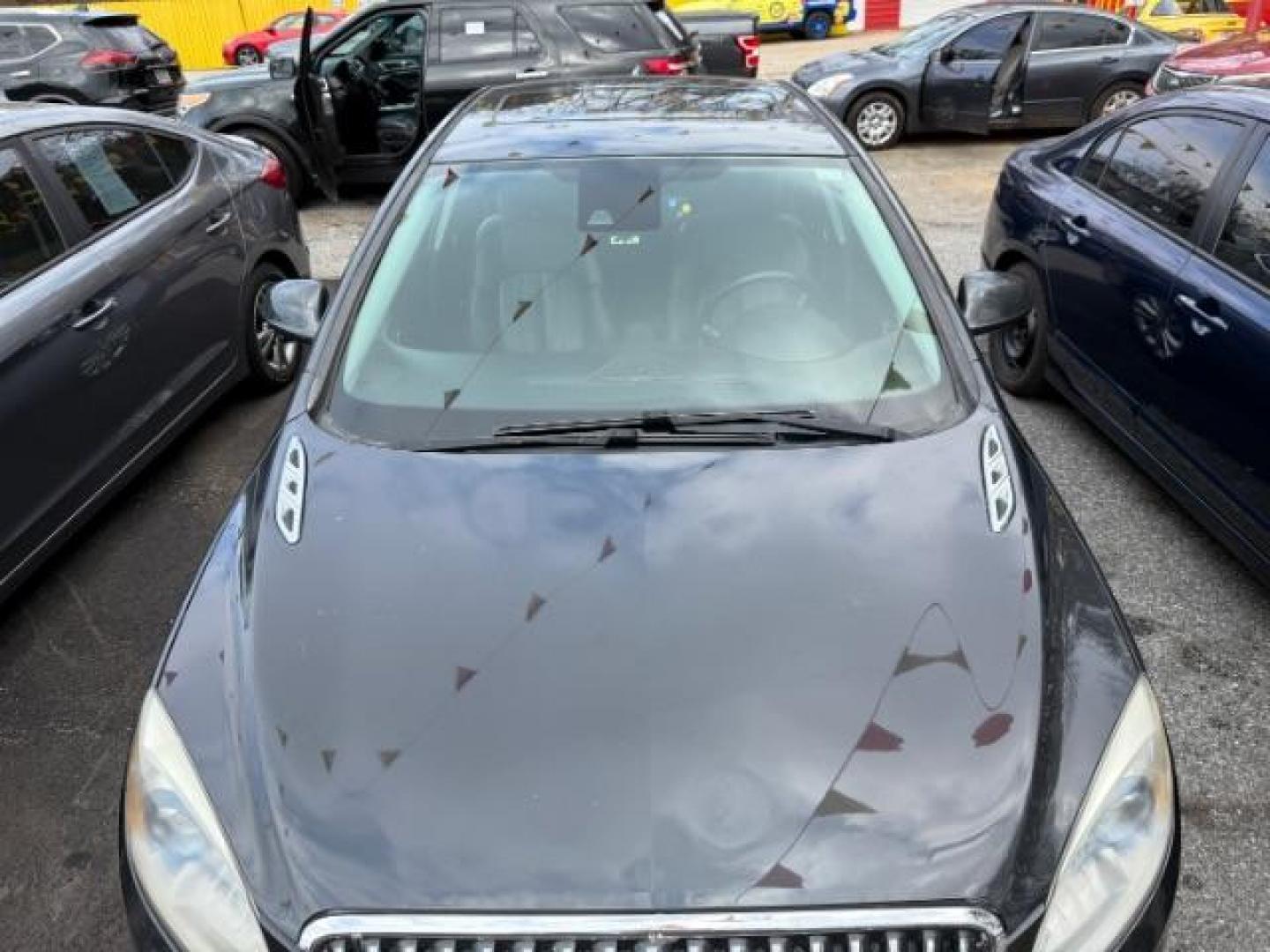 2015 Gray Buick Verano Leather (1G4PS5SK9F4) with an 2.4L L4 DOHC 16V FFV engine, 6-Speed Automatic transmission, located at 1806 Veterans Memorial Hwy SW, Austell, GA, 30168, (770) 944-9558, 33.817959, -84.606987 - Photo#12